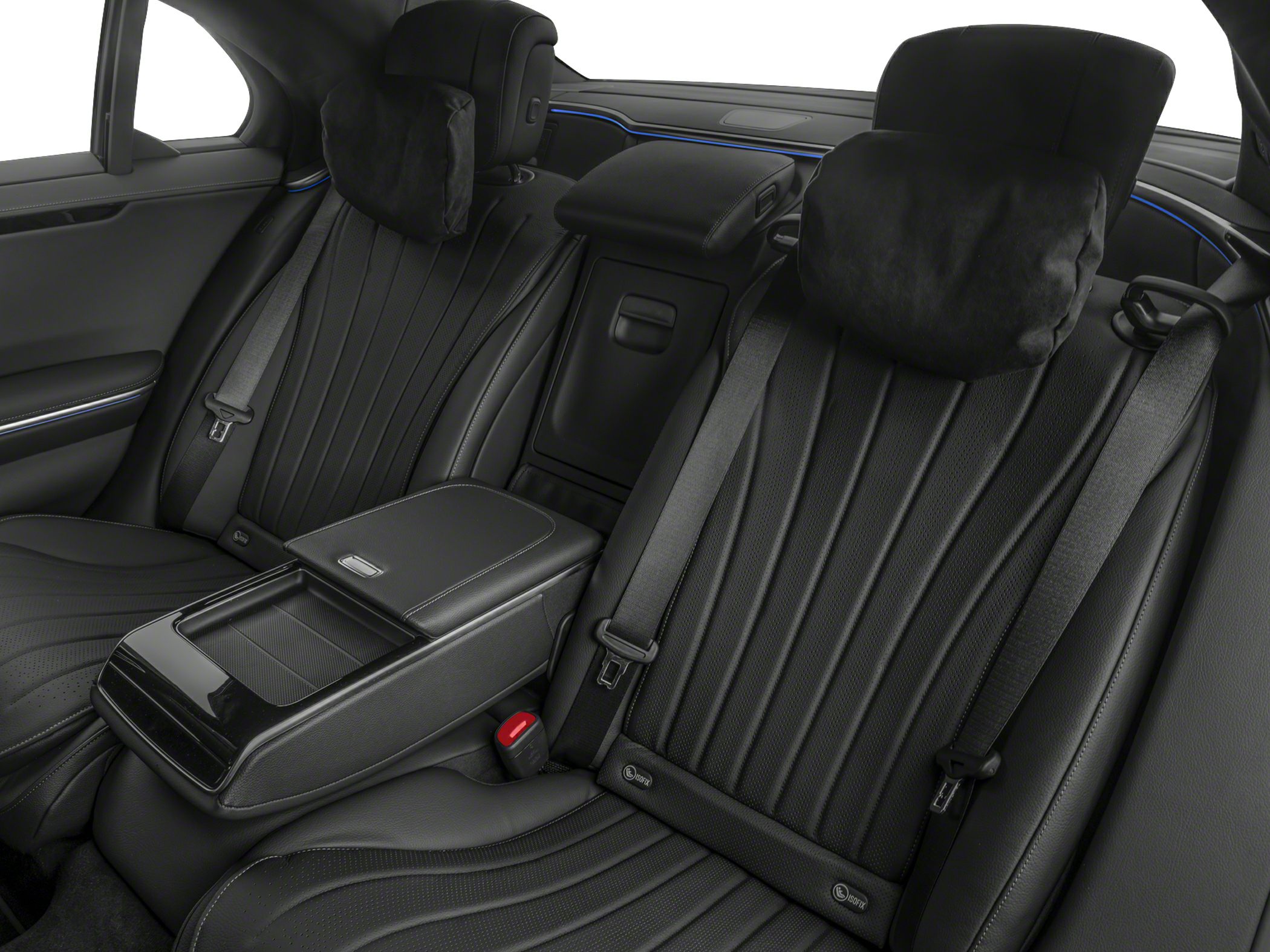 Premium rear seats with headrest cushions and central armrest console.