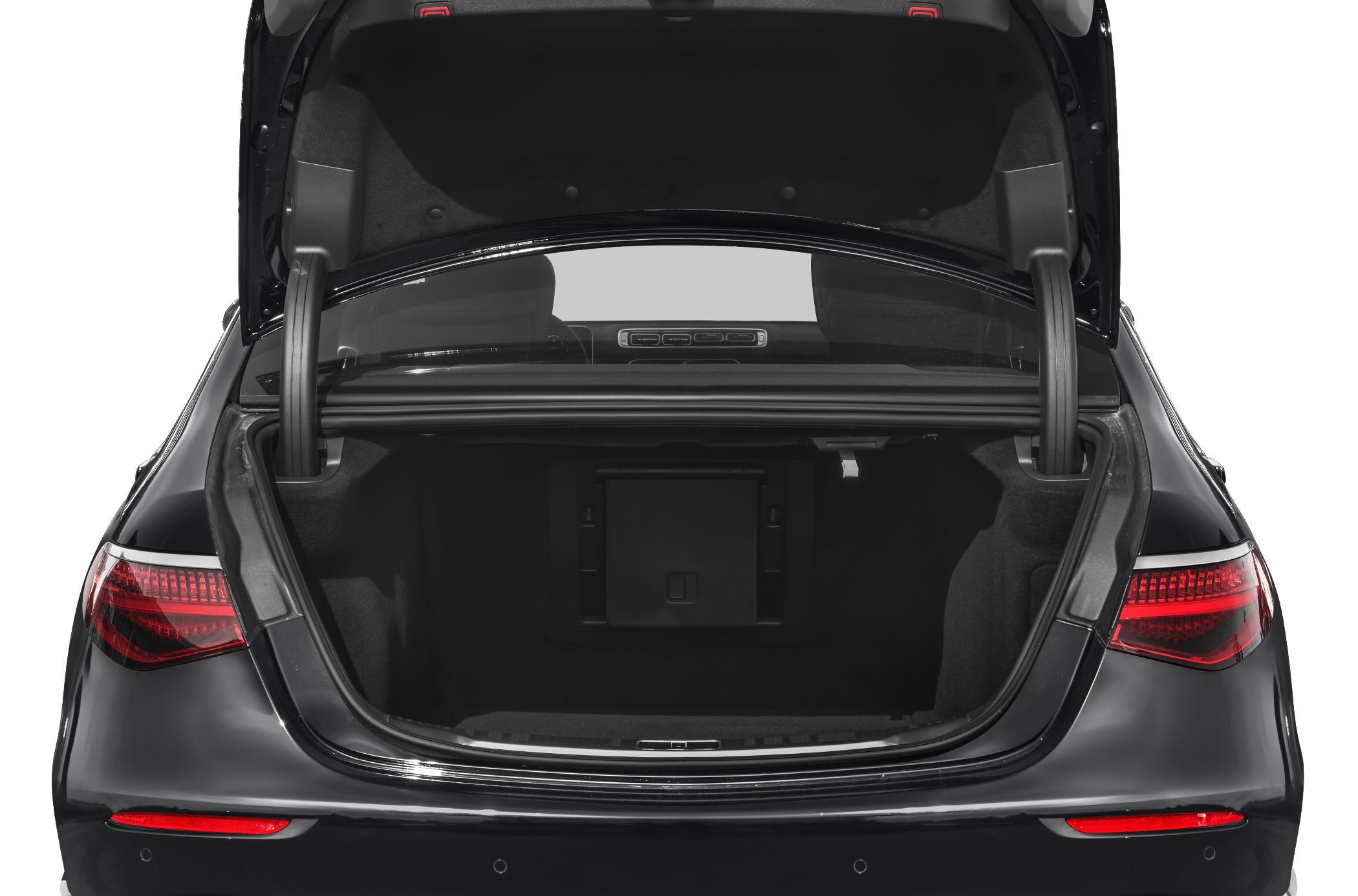 Open trunk showcasing spacious rear cargo area and tail lights