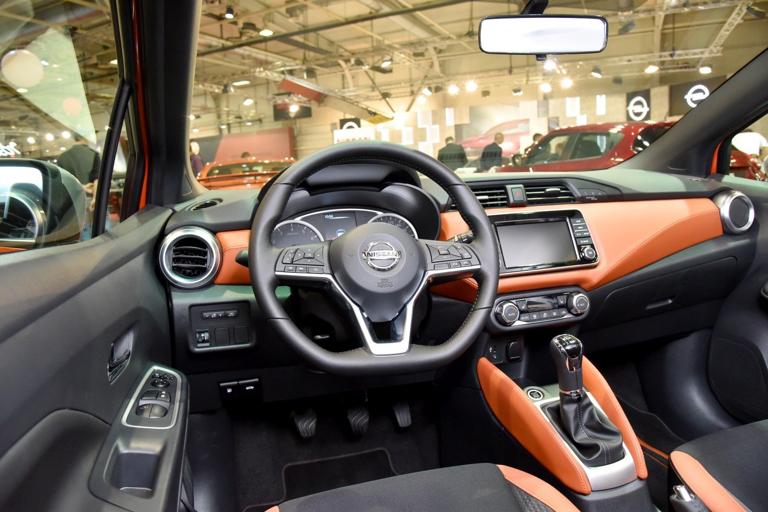 Modern dashboard with multifunction steering wheel and manual gear stick