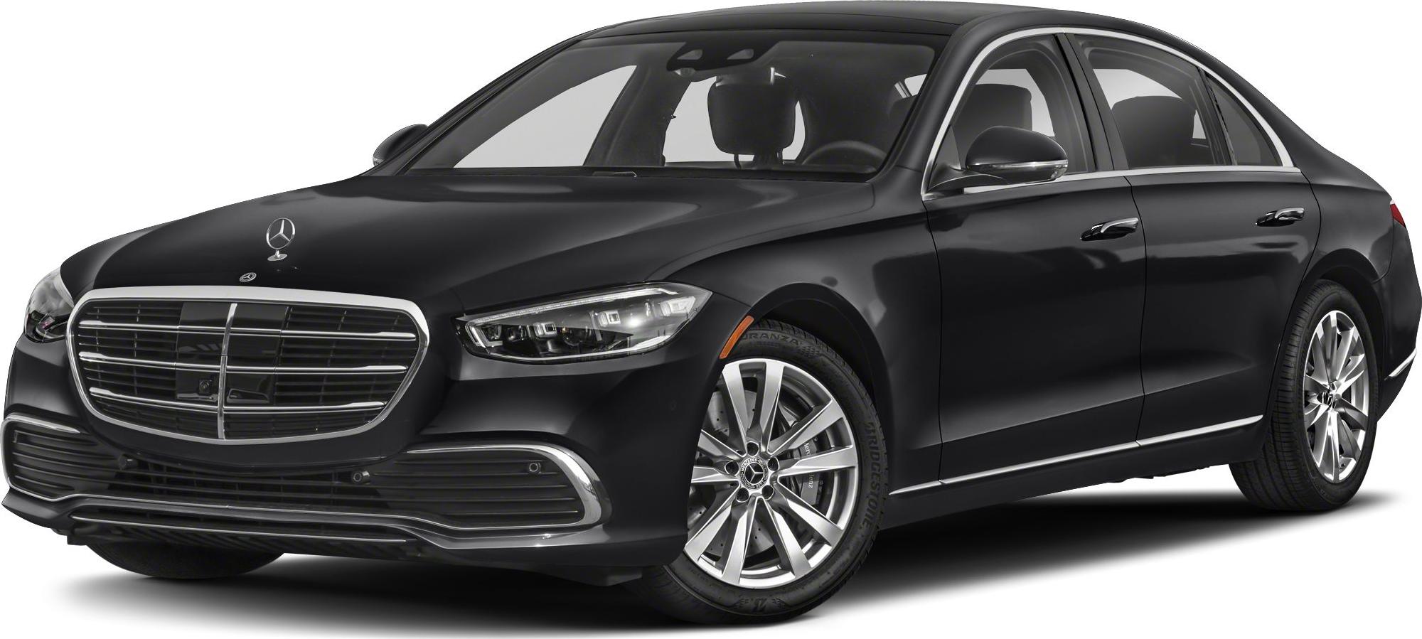 Front three-quarter view of a luxury sedan with chrome grille and sleek headlights