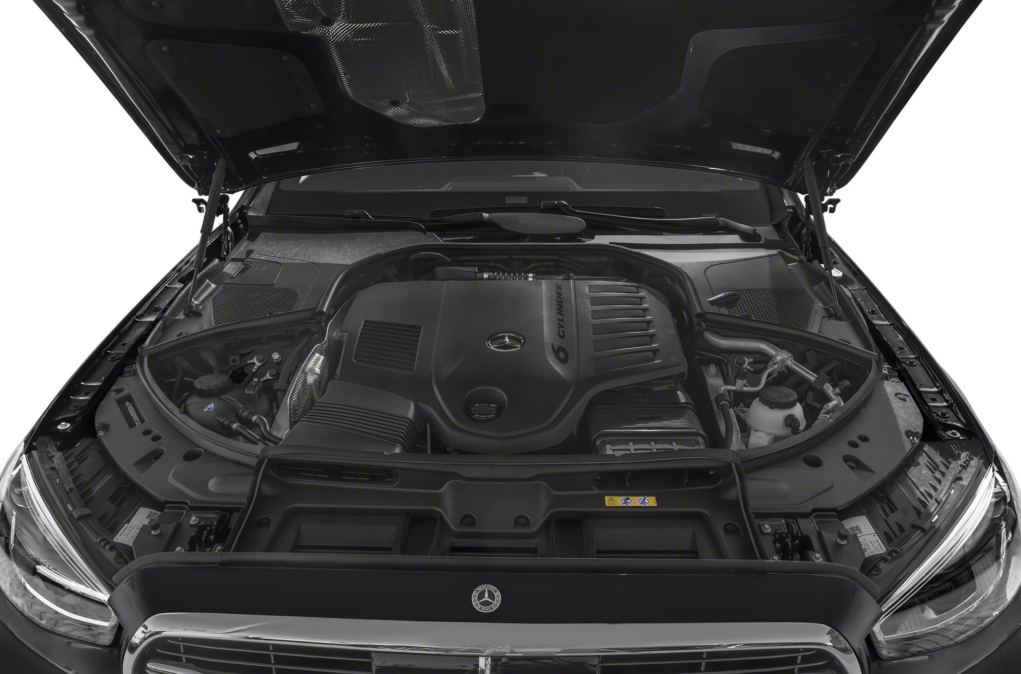 Engine bay featuring a 6-cylinder engine with cover and modern layout