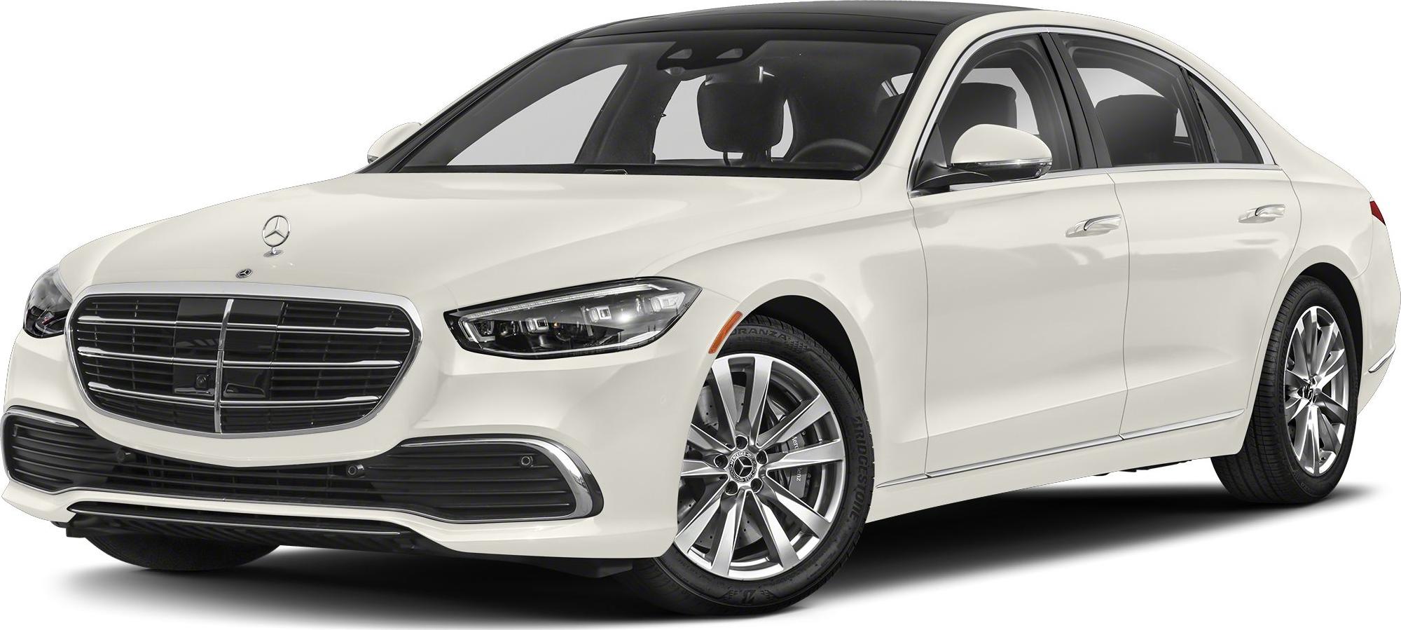 Front view of luxury sedan with LED headlights and large grille