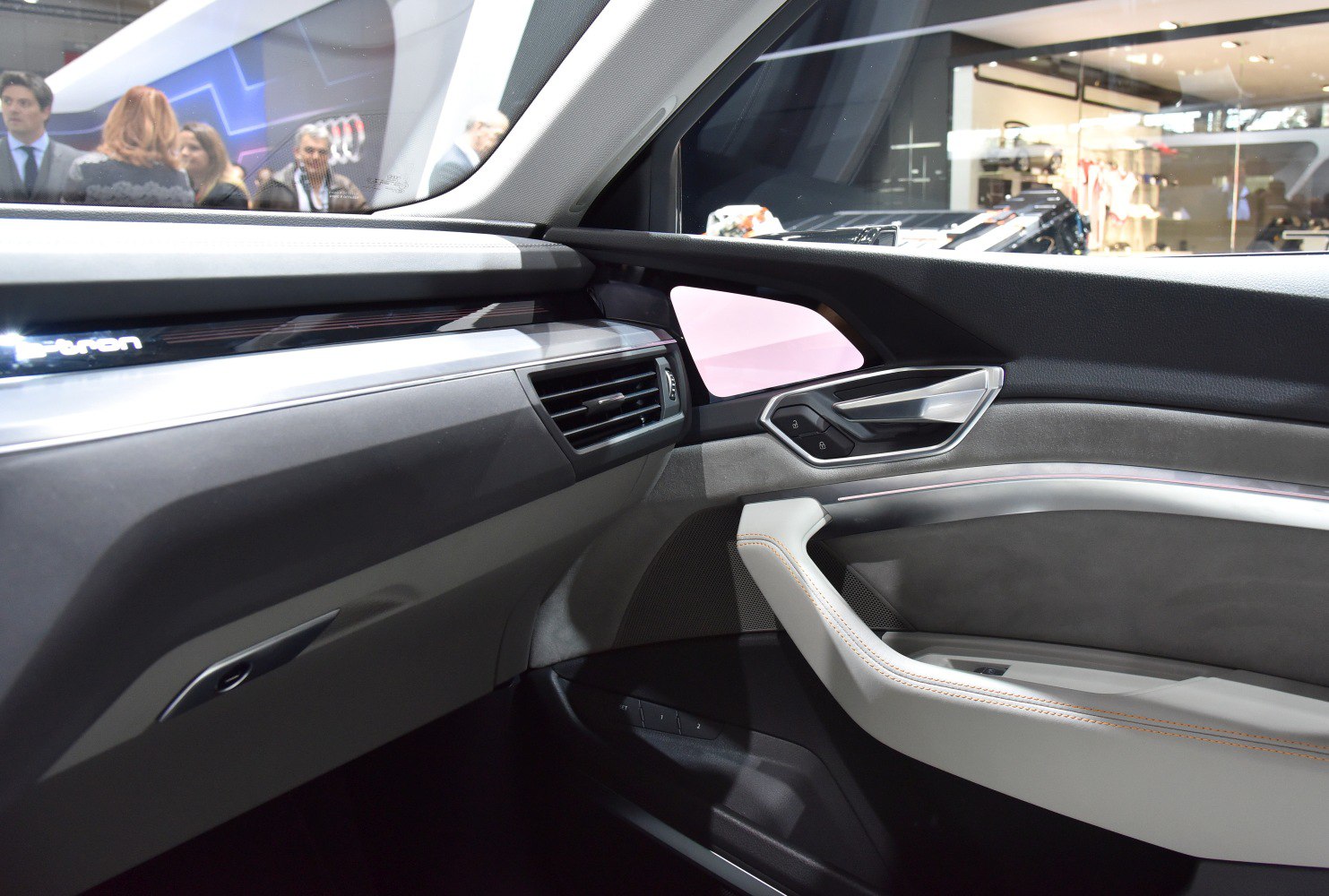 Modern Audi SUV interior with advanced controls and premium materials