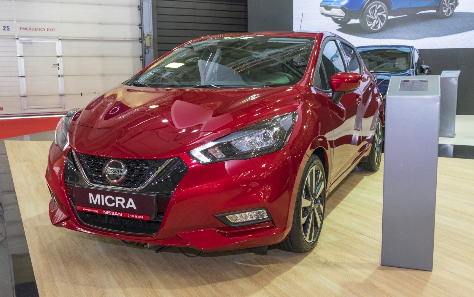 Front view of modern vehicle with LED headlights and sporty grille