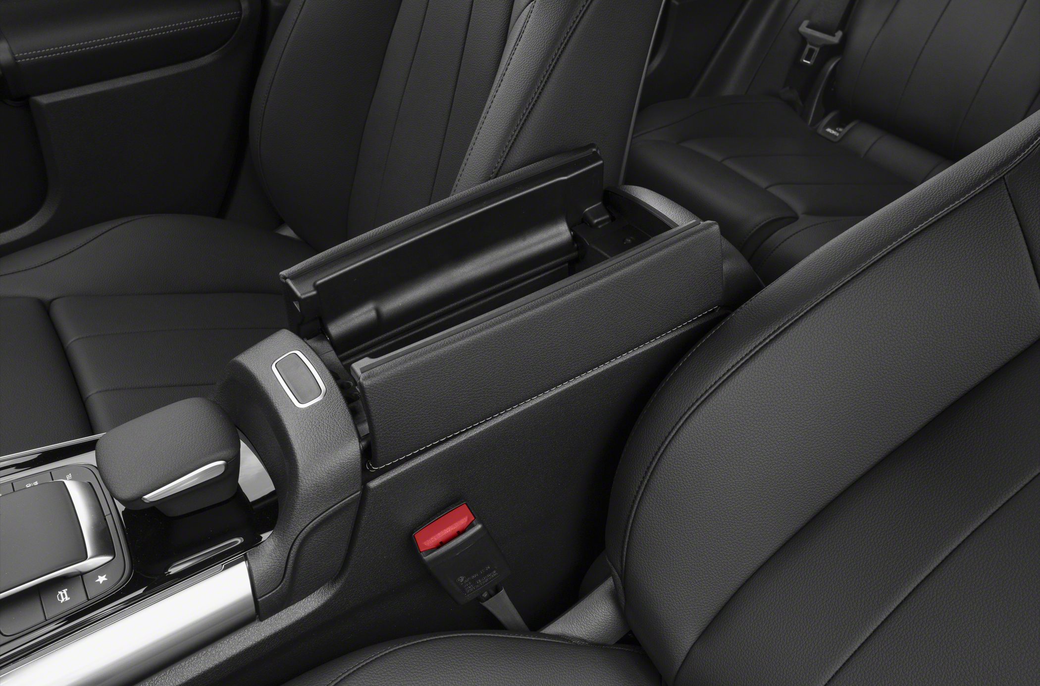 Center console armrest with storage compartment in black leather interior