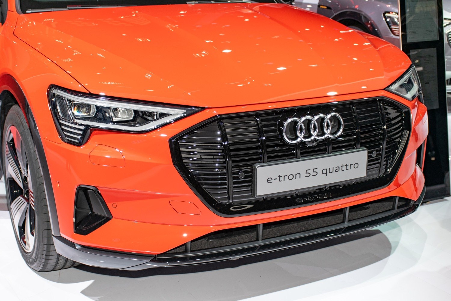 Sharp LED headlights and black front grille with Audi rings.