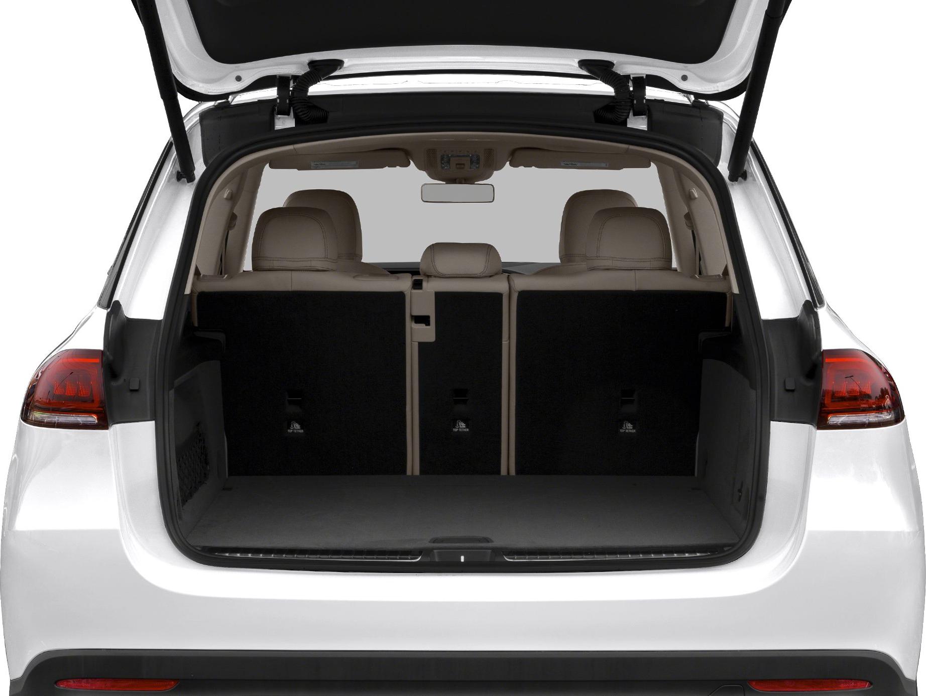 Open rear cargo area with beige seats and spacious trunk
