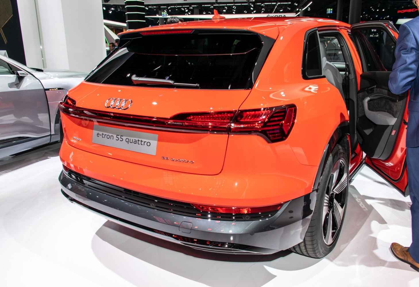 Rear view featuring distinct taillights and open rear door