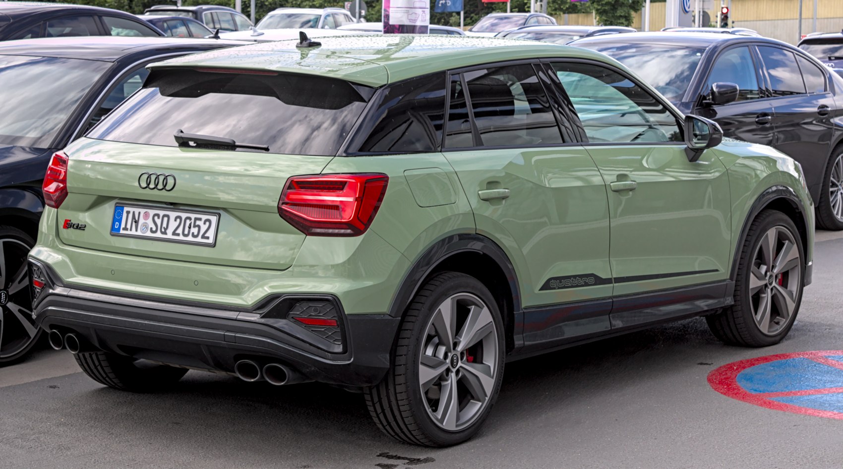 Rear view of a sporty SUV with quad exhaust and LED tail lights