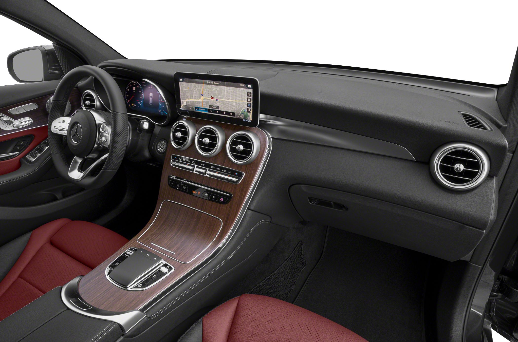 Luxury car interior with wood-trimmed center console and digital dashboard display