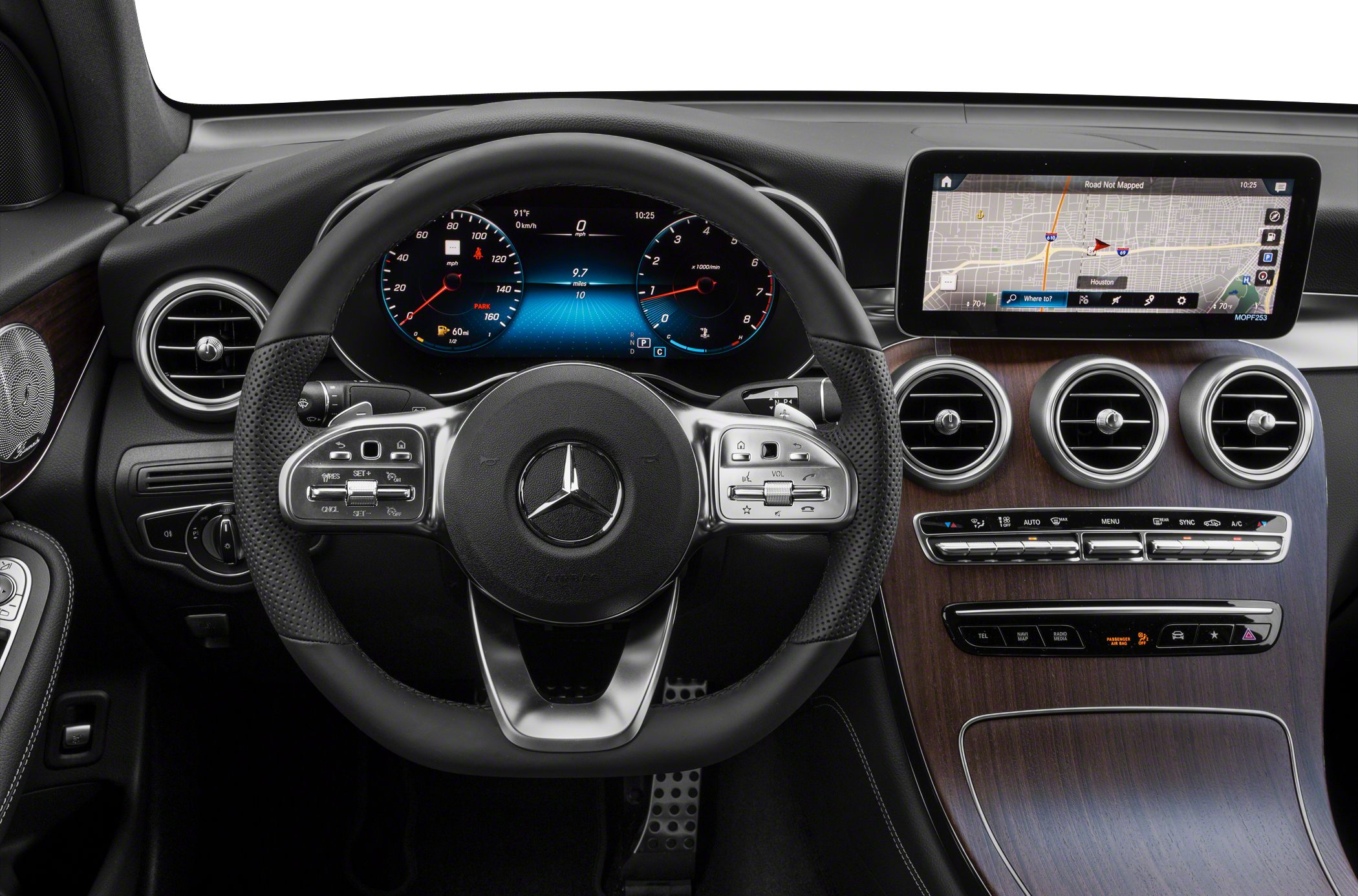 Steering wheel, digital instrument cluster, infotainment screen, wood trim dashboard
