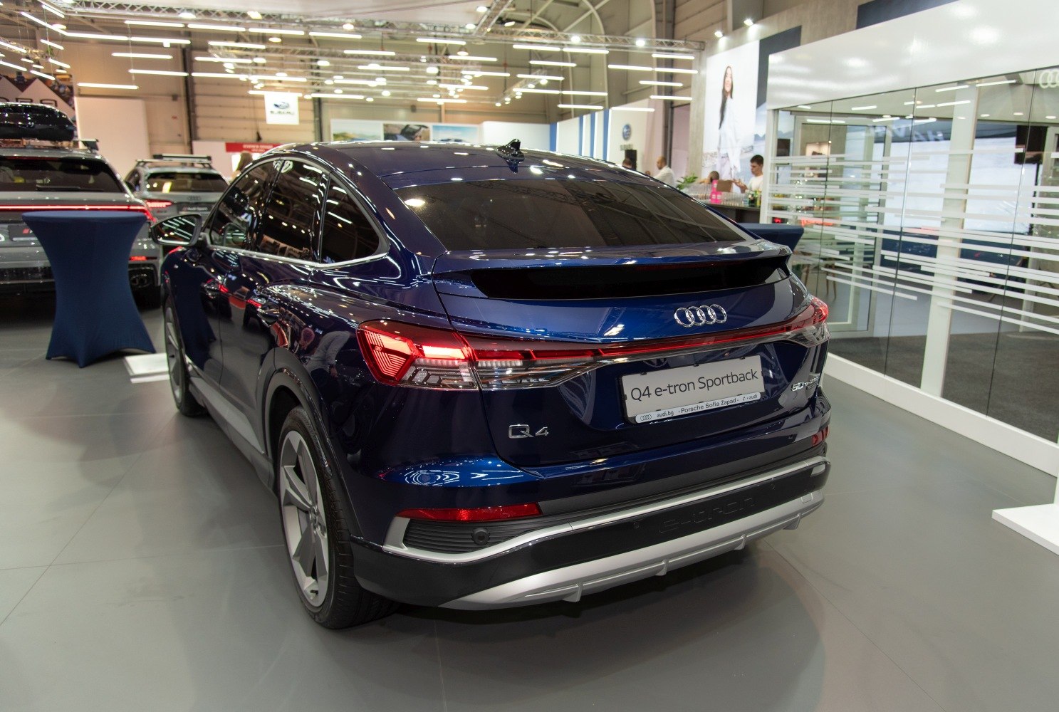 Rear view of sleek electric SUV with LED taillights