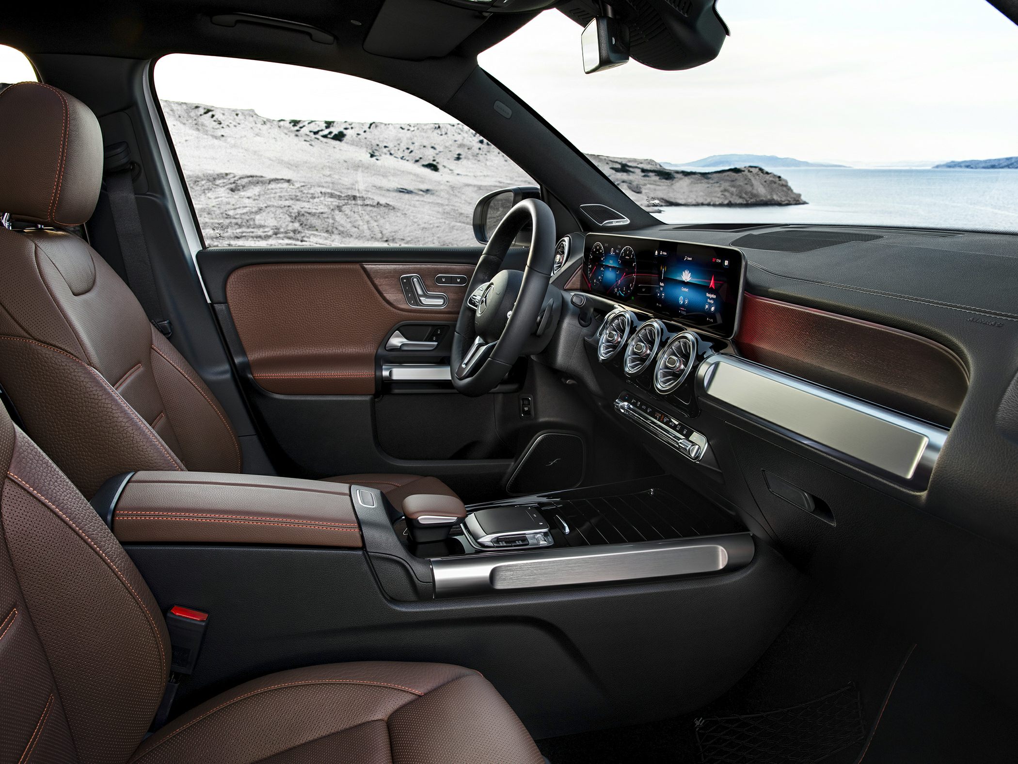 Luxury SUV interior with digital dashboard and brown leather seats