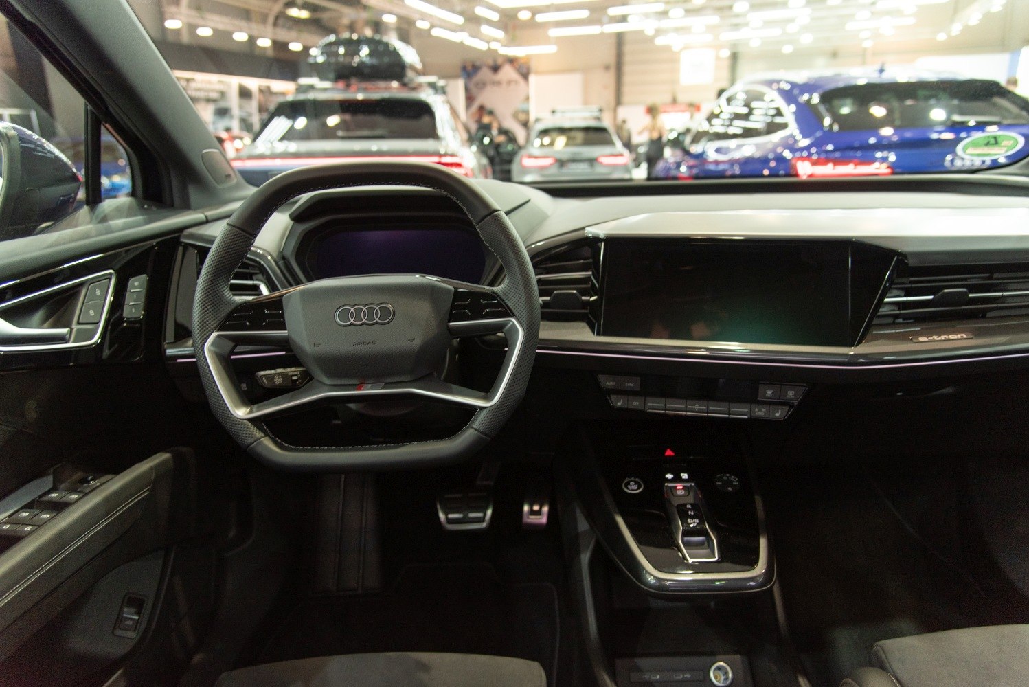 Modern digital dashboard and sporty steering wheel
