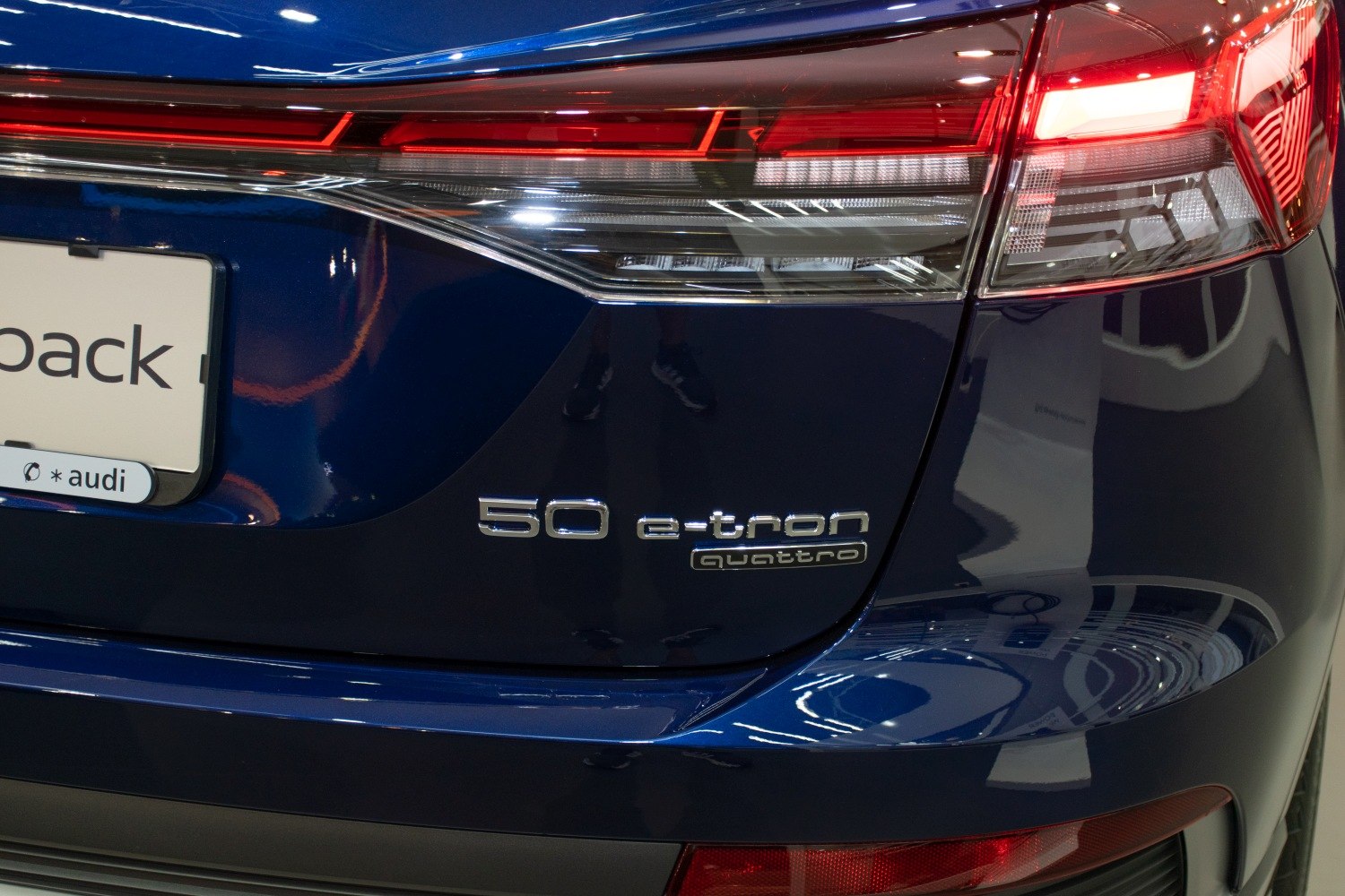 Close-up of rear LED tail light and 50 e-tron quattro badge