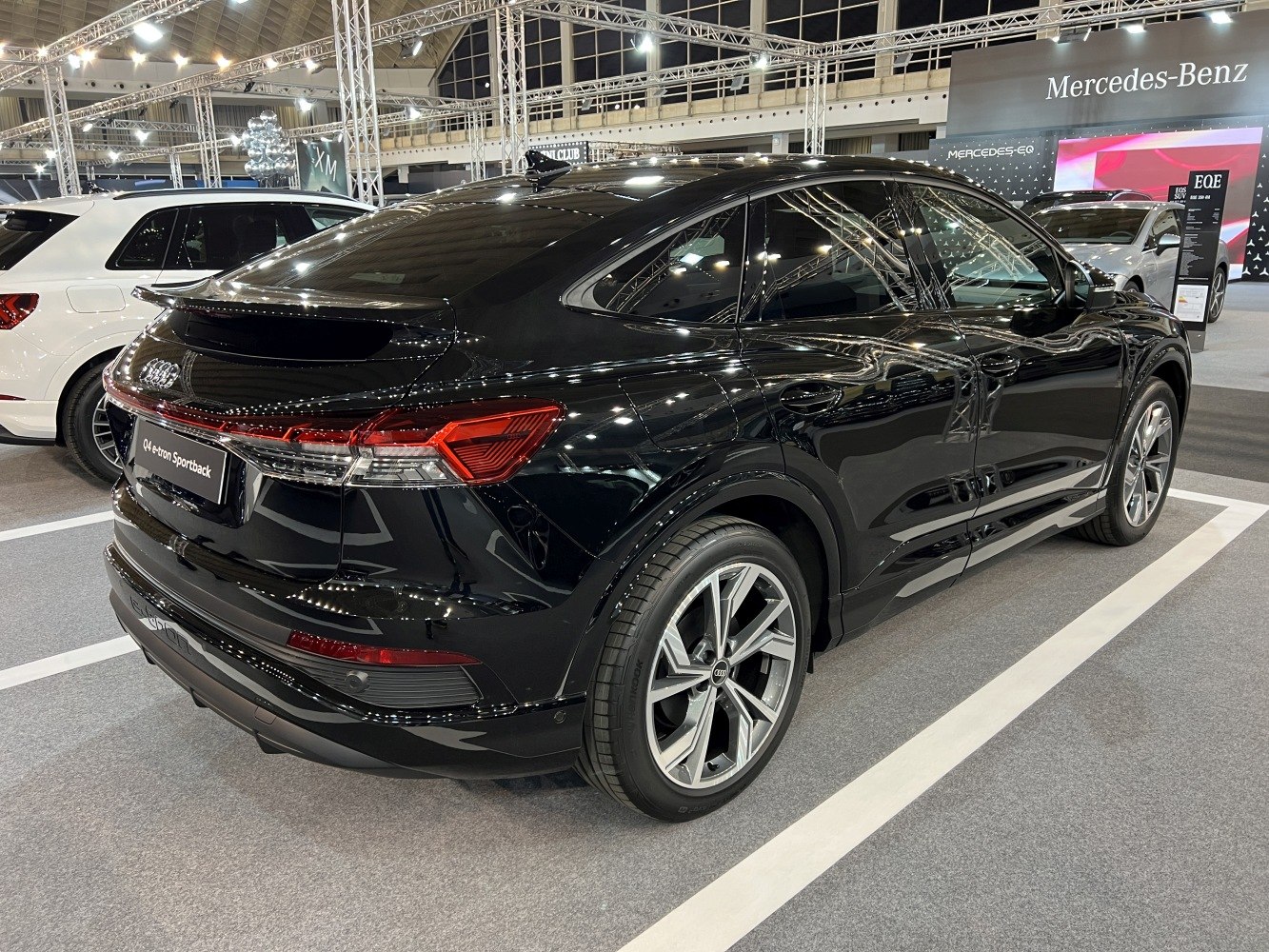 Black electric SUV with sportback design and LED tail lights
