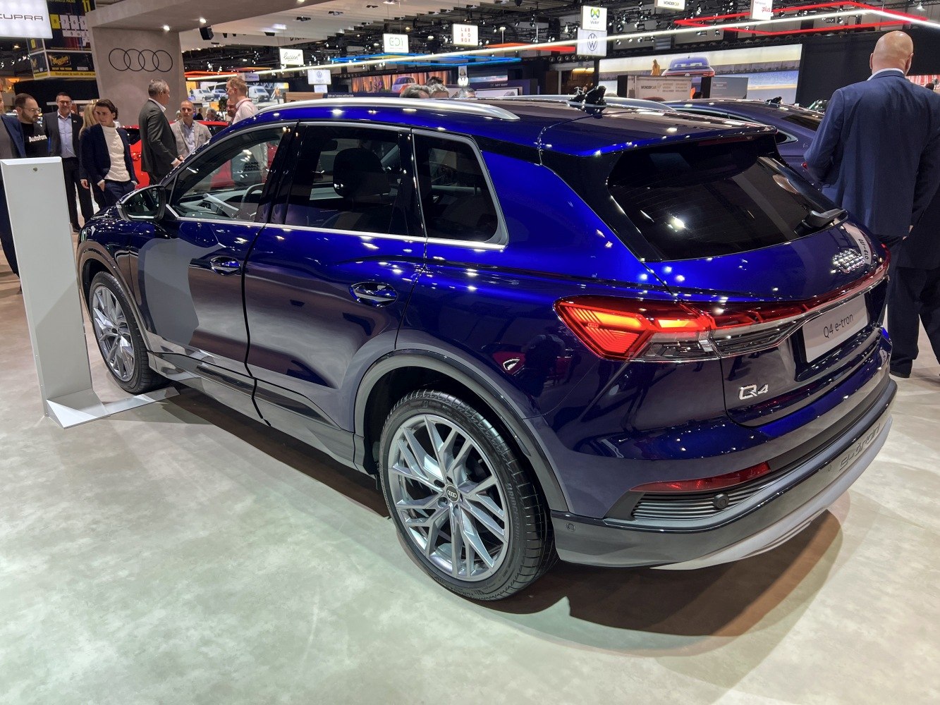 Rear side view of SUV with LED tail lights and blue paint