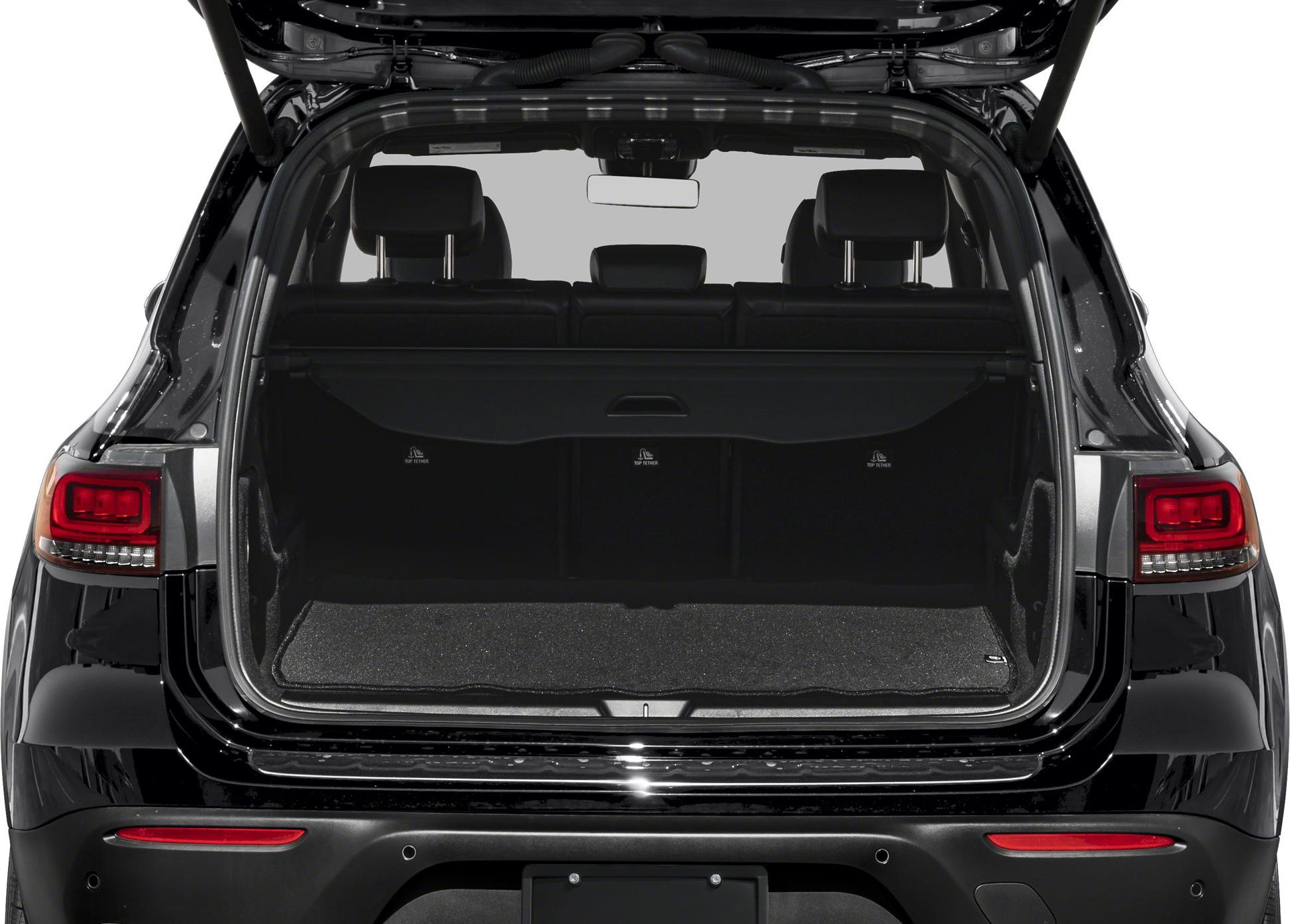 Open rear cargo area with visible seats and spacious trunk space
