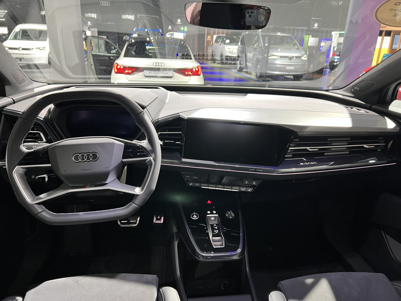 Digital dashboard and steering wheel with minimalist modern design