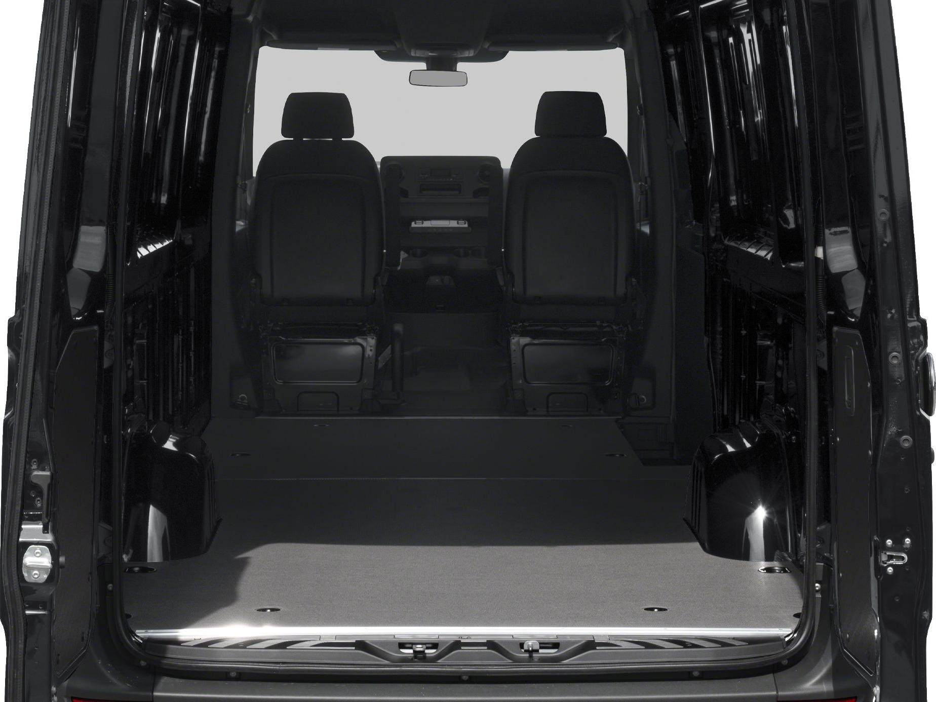 Spacious cargo interior with two front seats and empty rear compartment