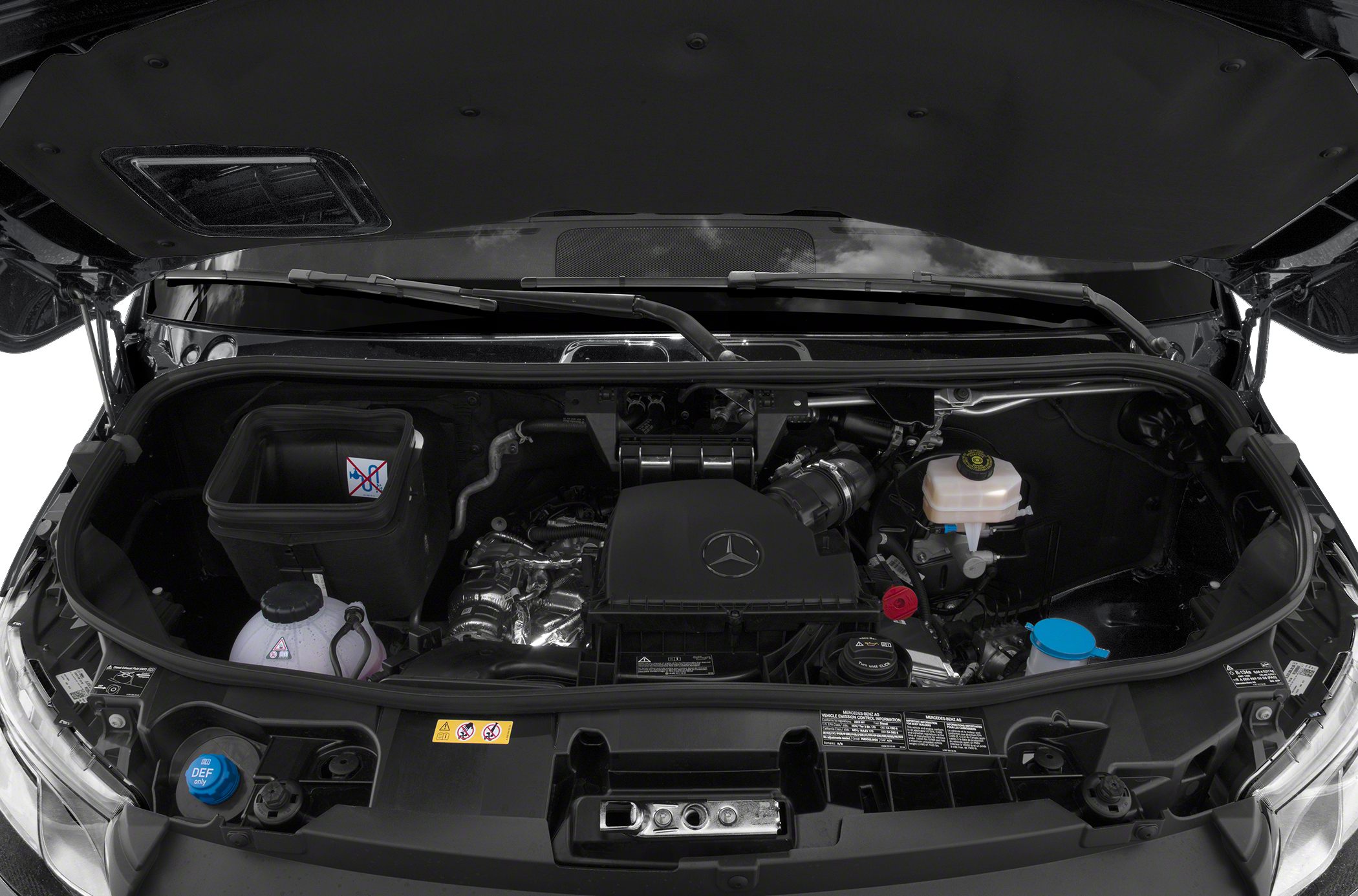 Mercedes-Benz Sprinter compact panel van engine bay with visible fluid reservoirs and turbocharger.