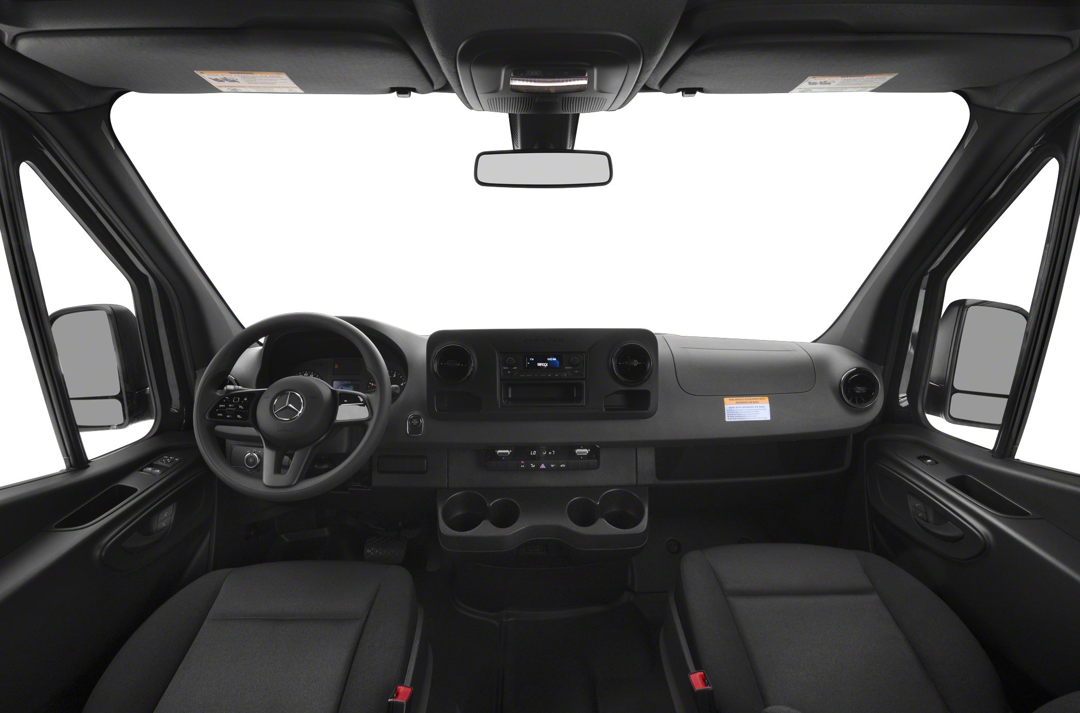 Dashboard, steering wheel, dual front seats in van interior
