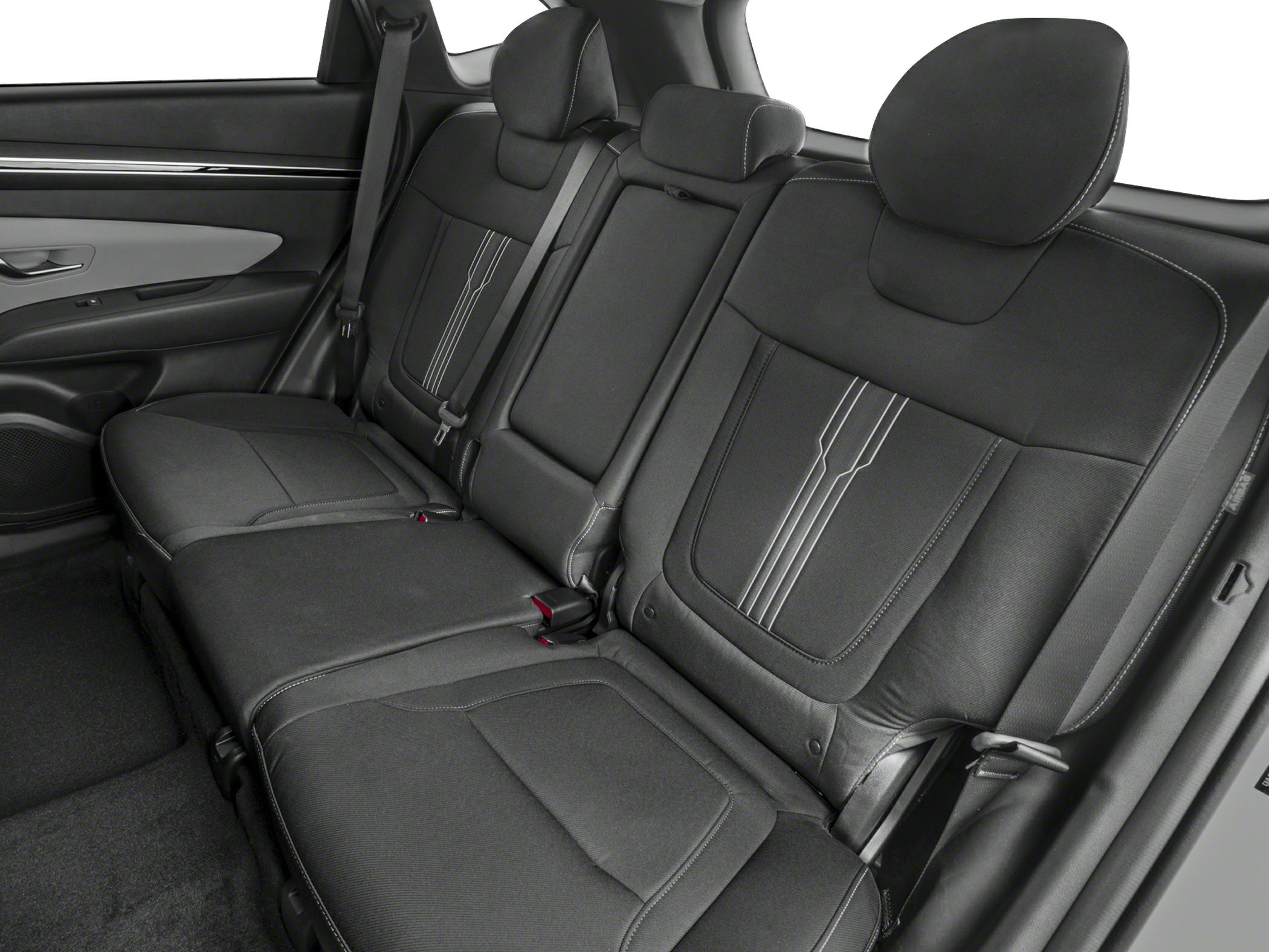 Rear fabric seats with headrests and seat belts in a modern SUV interior