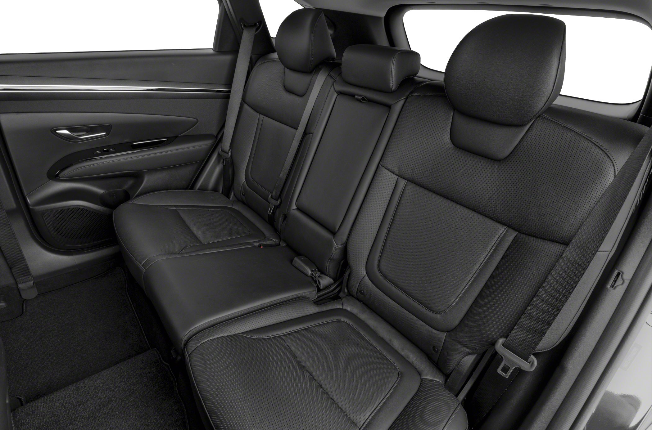 Rear leather seats with headrests and seat belts in modern SUV interior