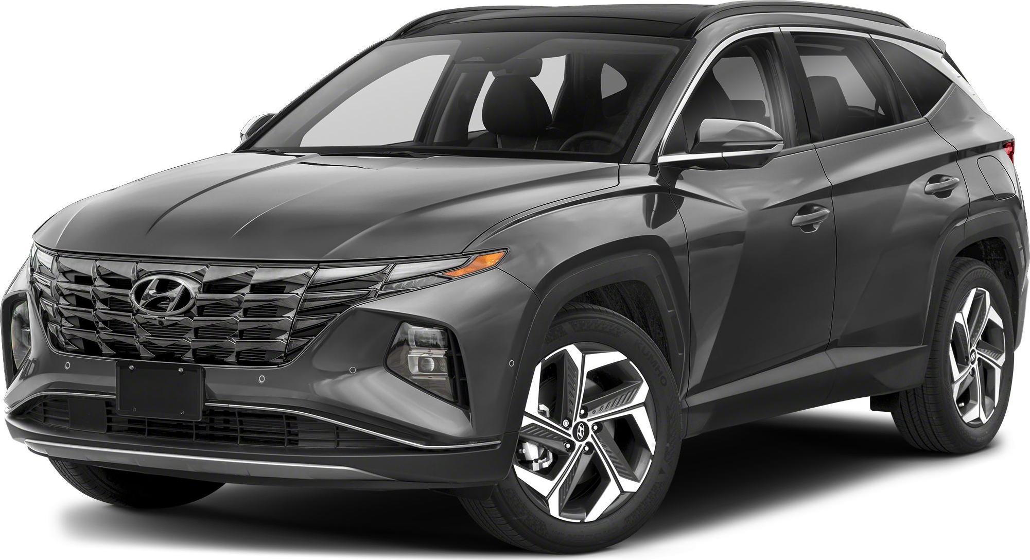 Front view with bold grille, LED headlights, and alloy wheels