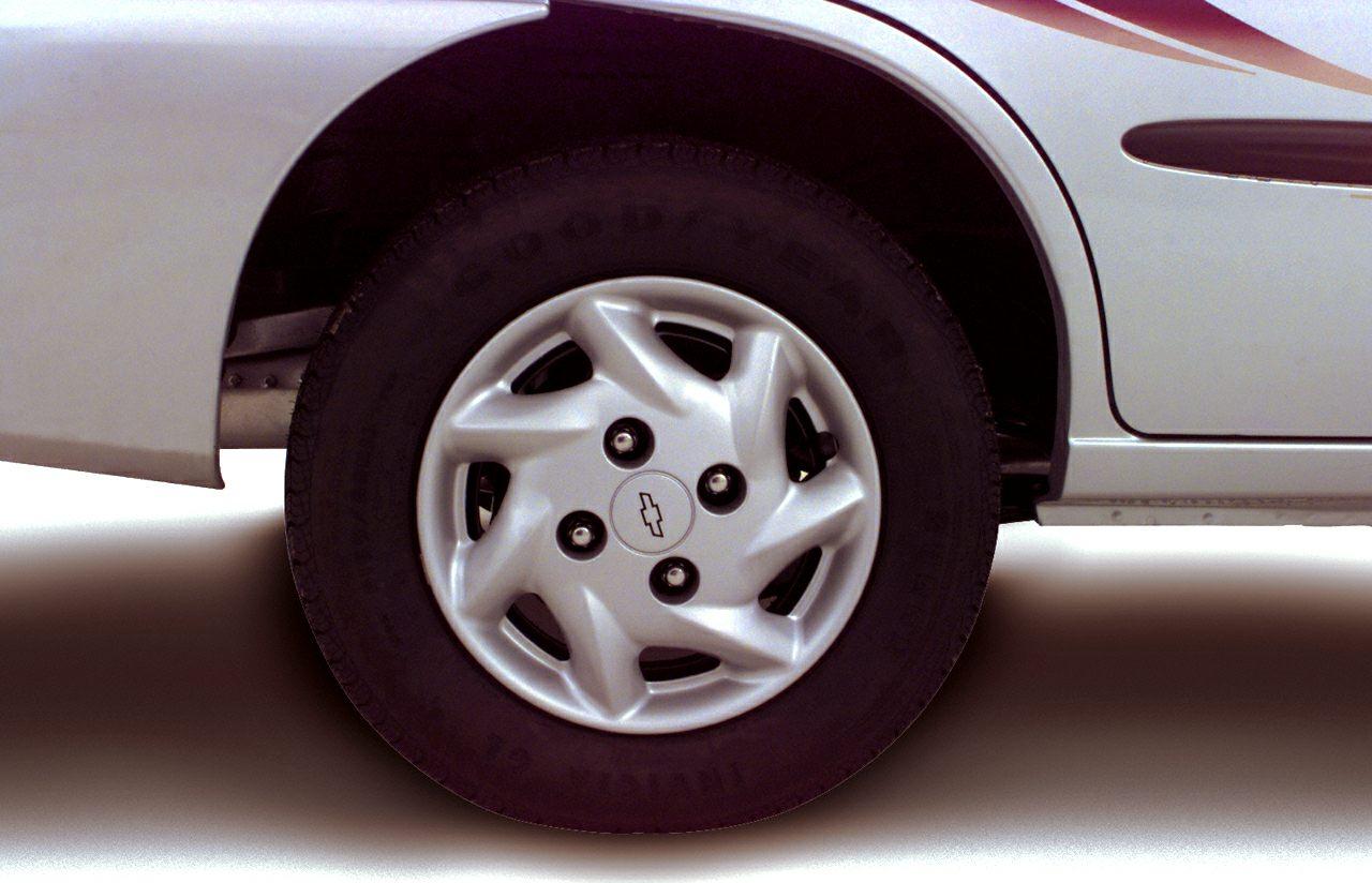 Close-up of Chevrolet Metro five-spoke alloy wheel with Goodyear tire.