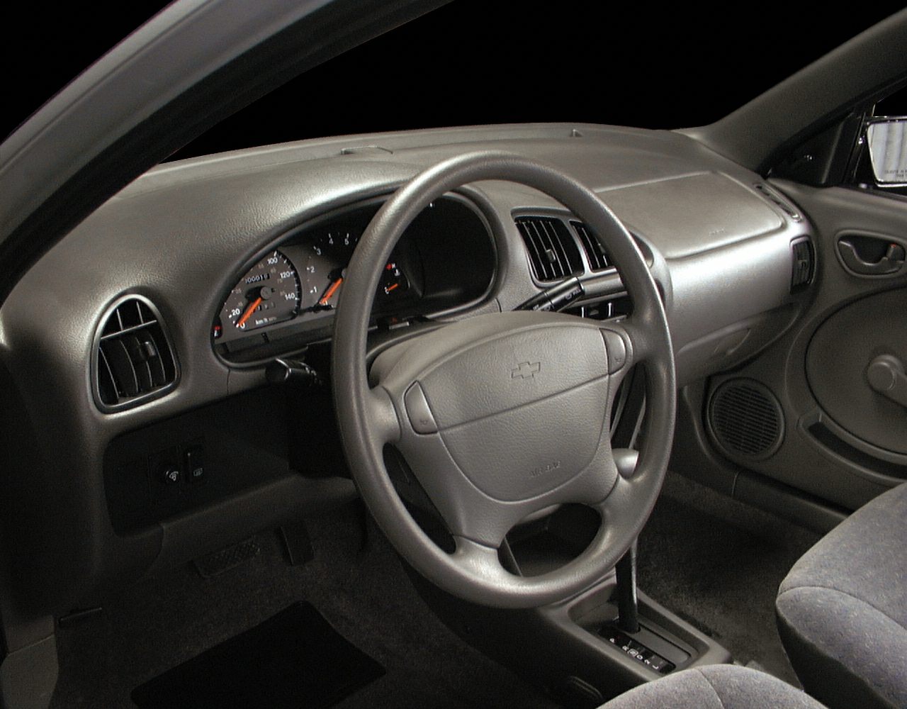 Dashboard, steering wheel, and instrument cluster of a car interior