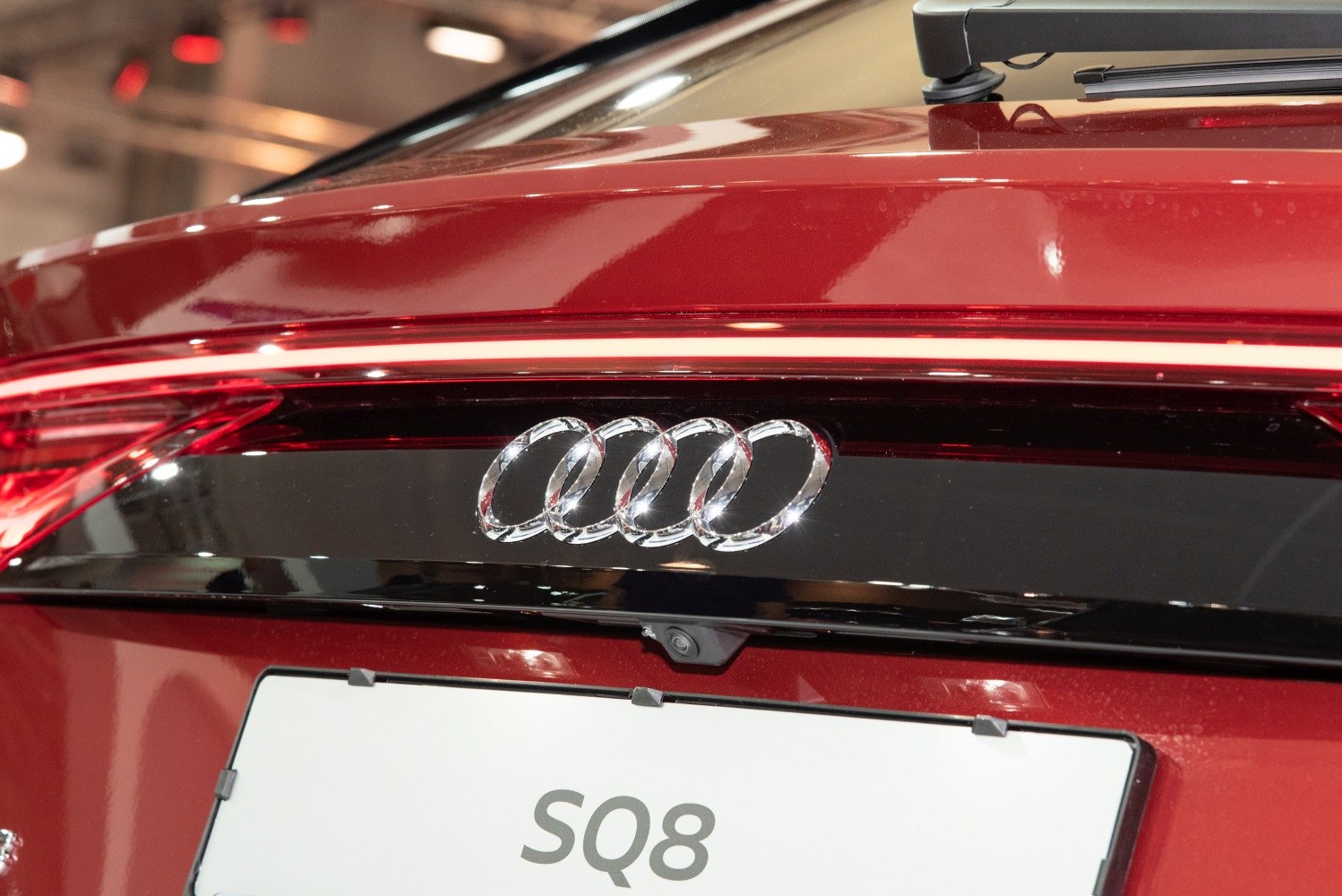 Close-up of LED tail light and four-ring rear badge.