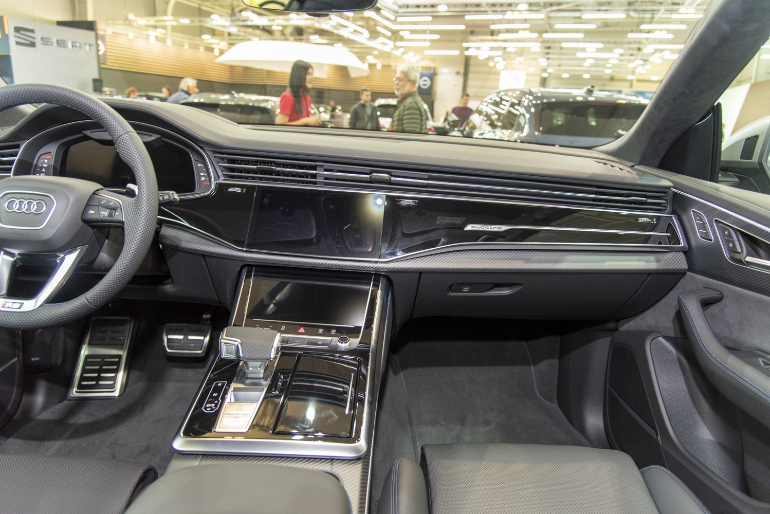 Modern Audi SUV interior with digital dashboard and advanced center console design