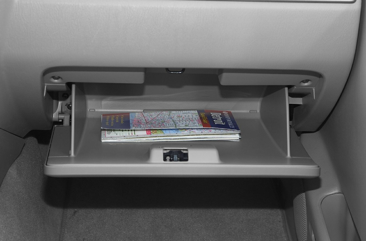Glove compartment interior with map storage