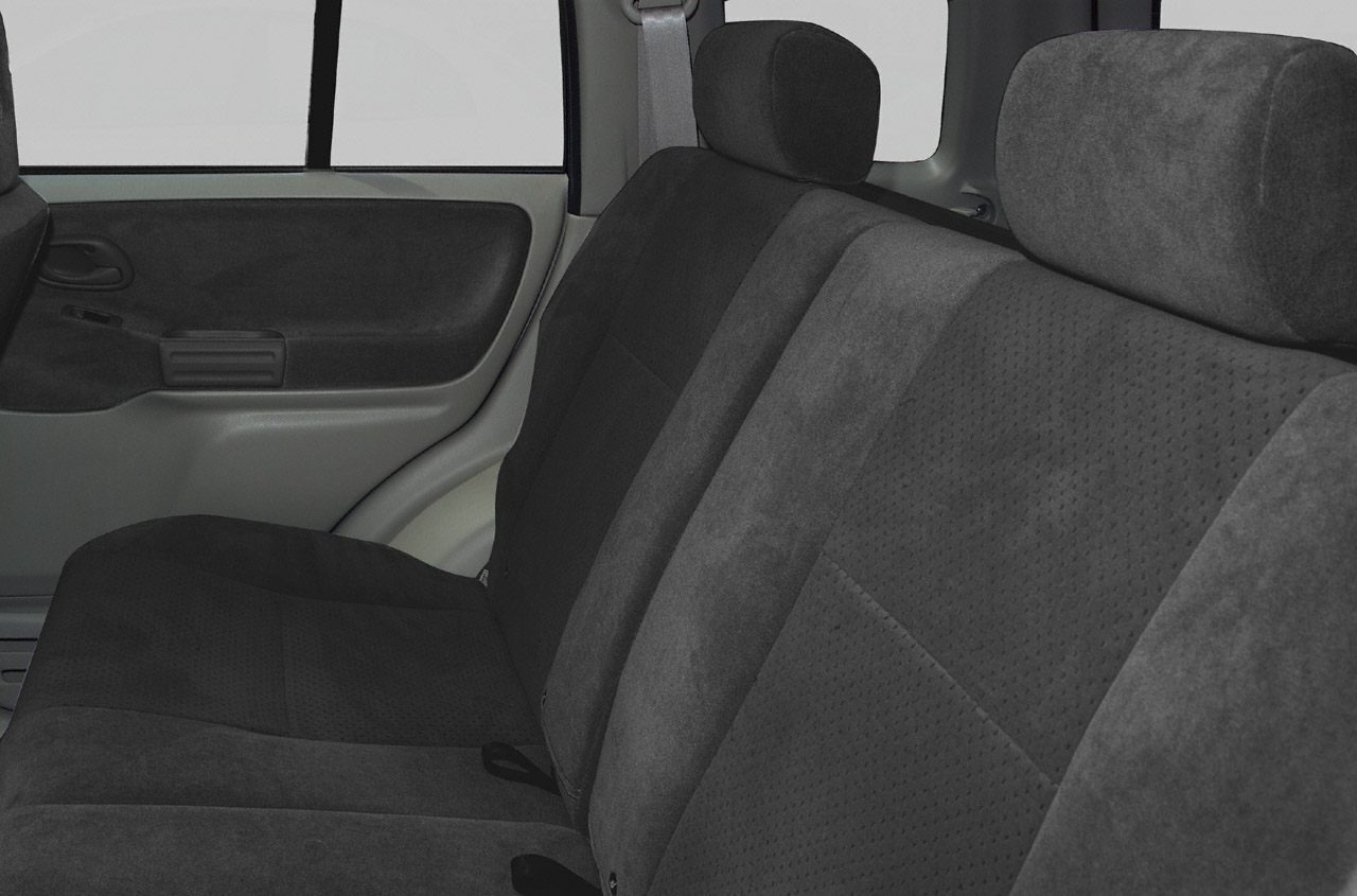 Rear seats and door panel upholstery in dark fabric with headrests