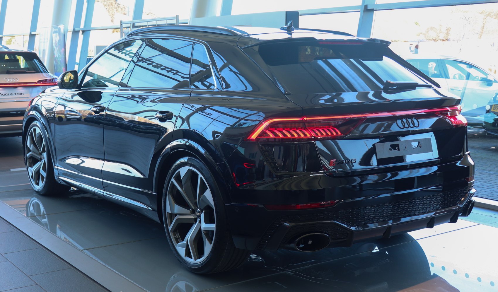 Rear and side view with LED tail lights and sporty exhaust