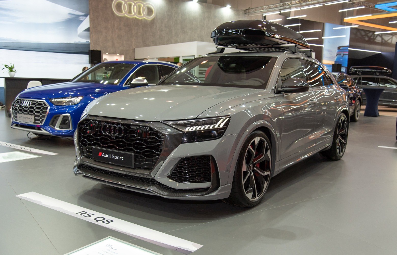 SUV with roof cargo box and sporty alloy wheels