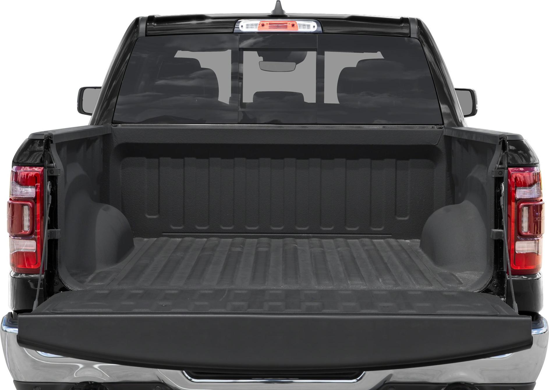 Spacious and lined truck bed with open tailgate and rear window