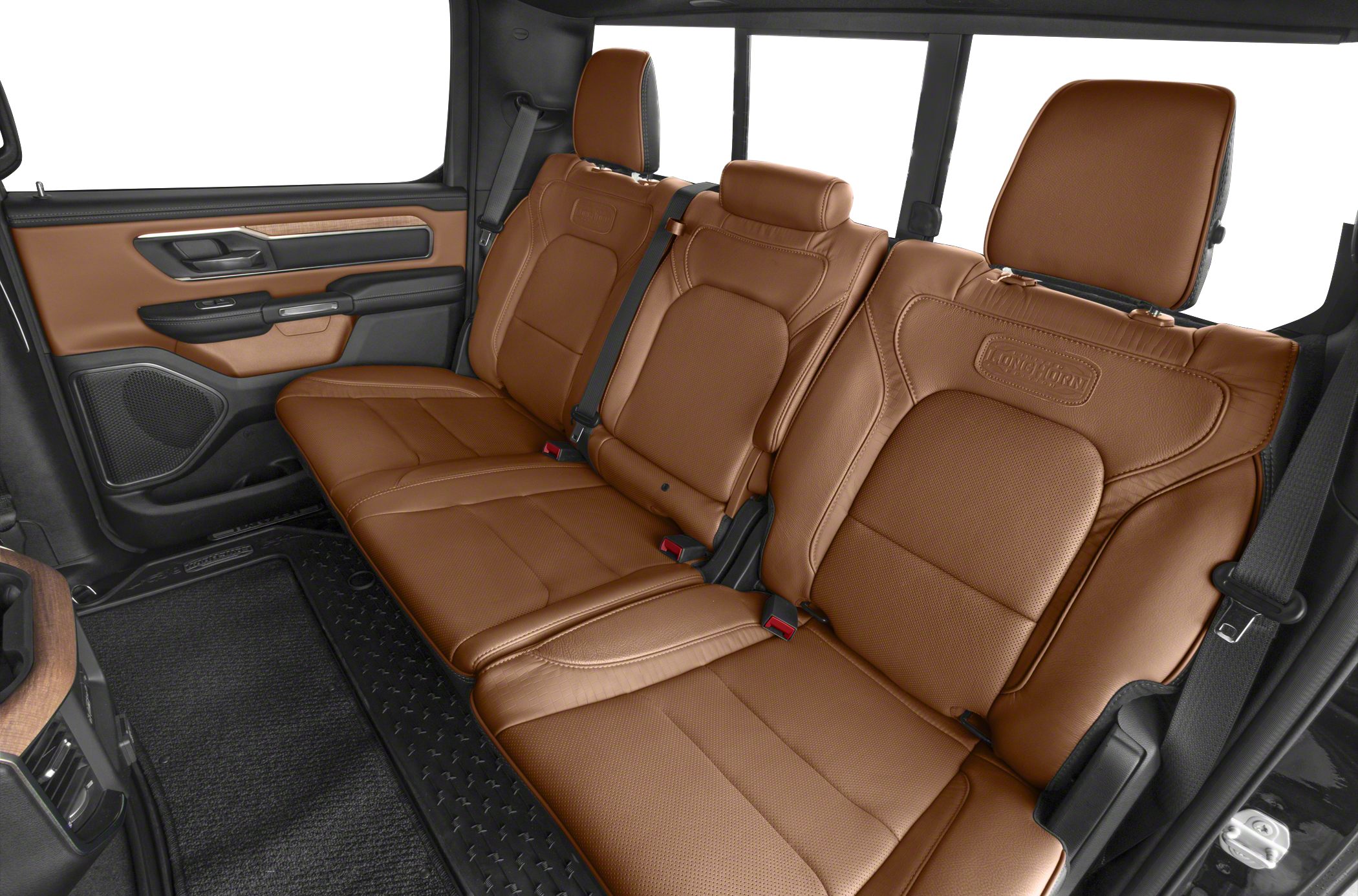 Brown leather rear seats with detailed stitching and integrated headrests.