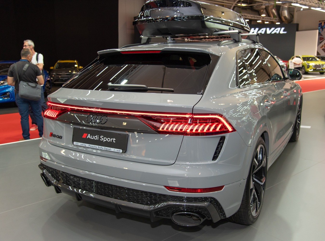 Rear view with LED tail lights and roof box