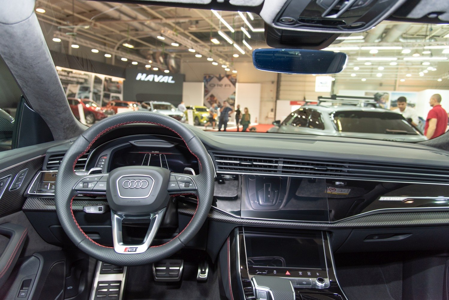 Digital dashboard and sporty steering wheel with red stitching