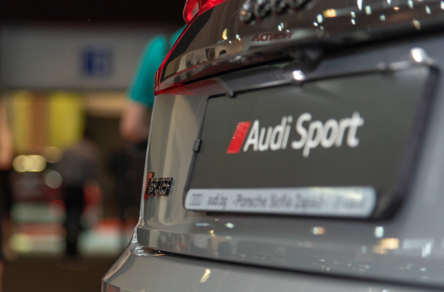 Close-up of rear badge and Audi Sport branding