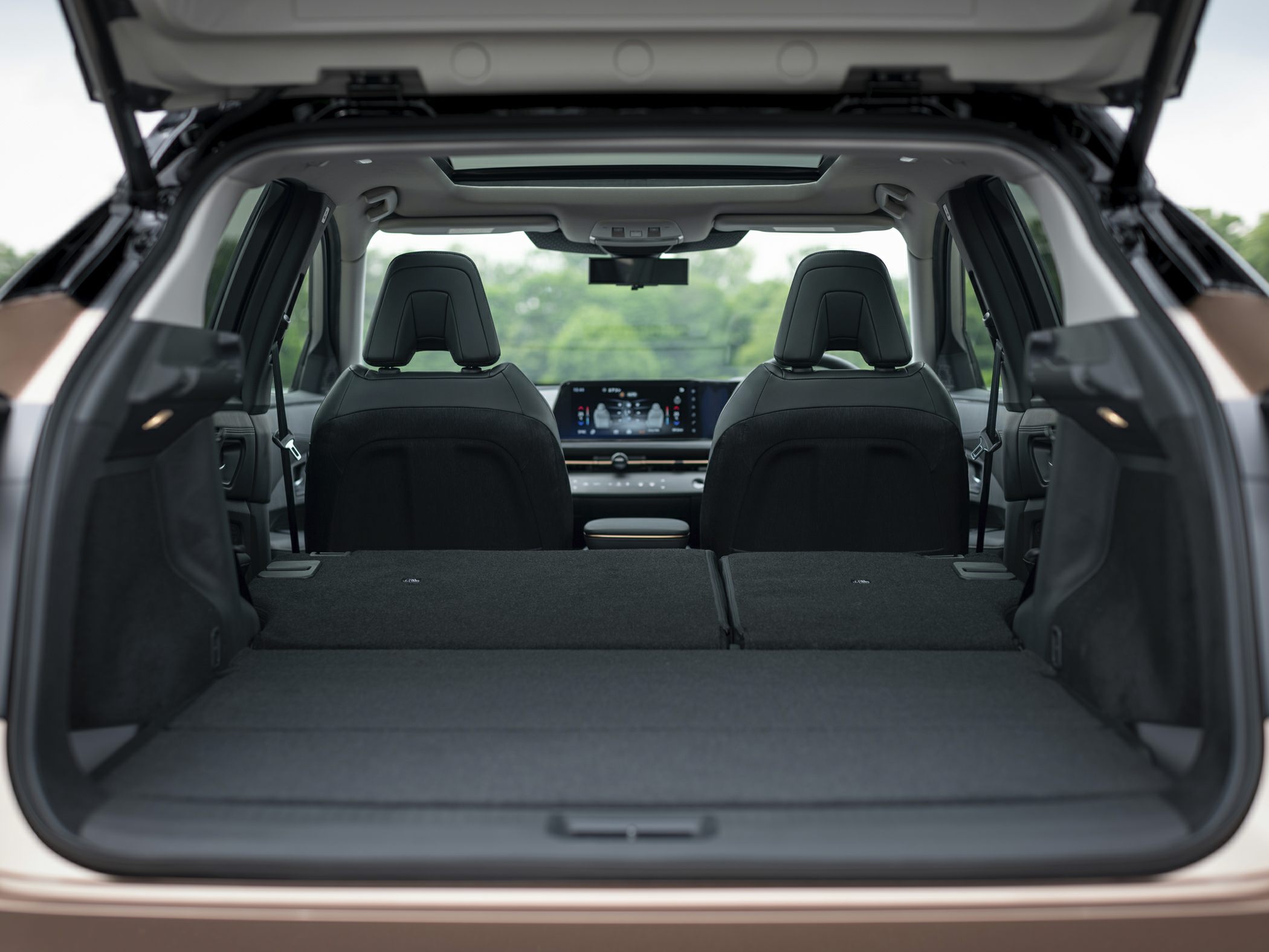 Folded rear seats with spacious cargo area and panoramic sunroof