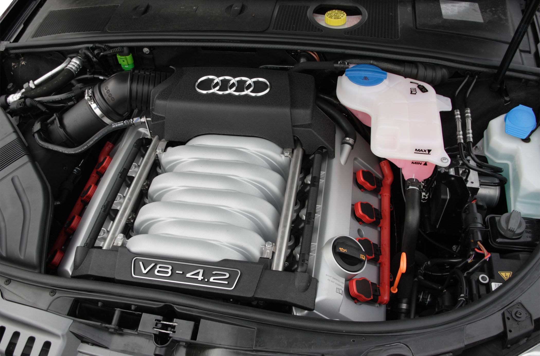 V8 4.2 engine with visible fluid reservoirs and ignition coils