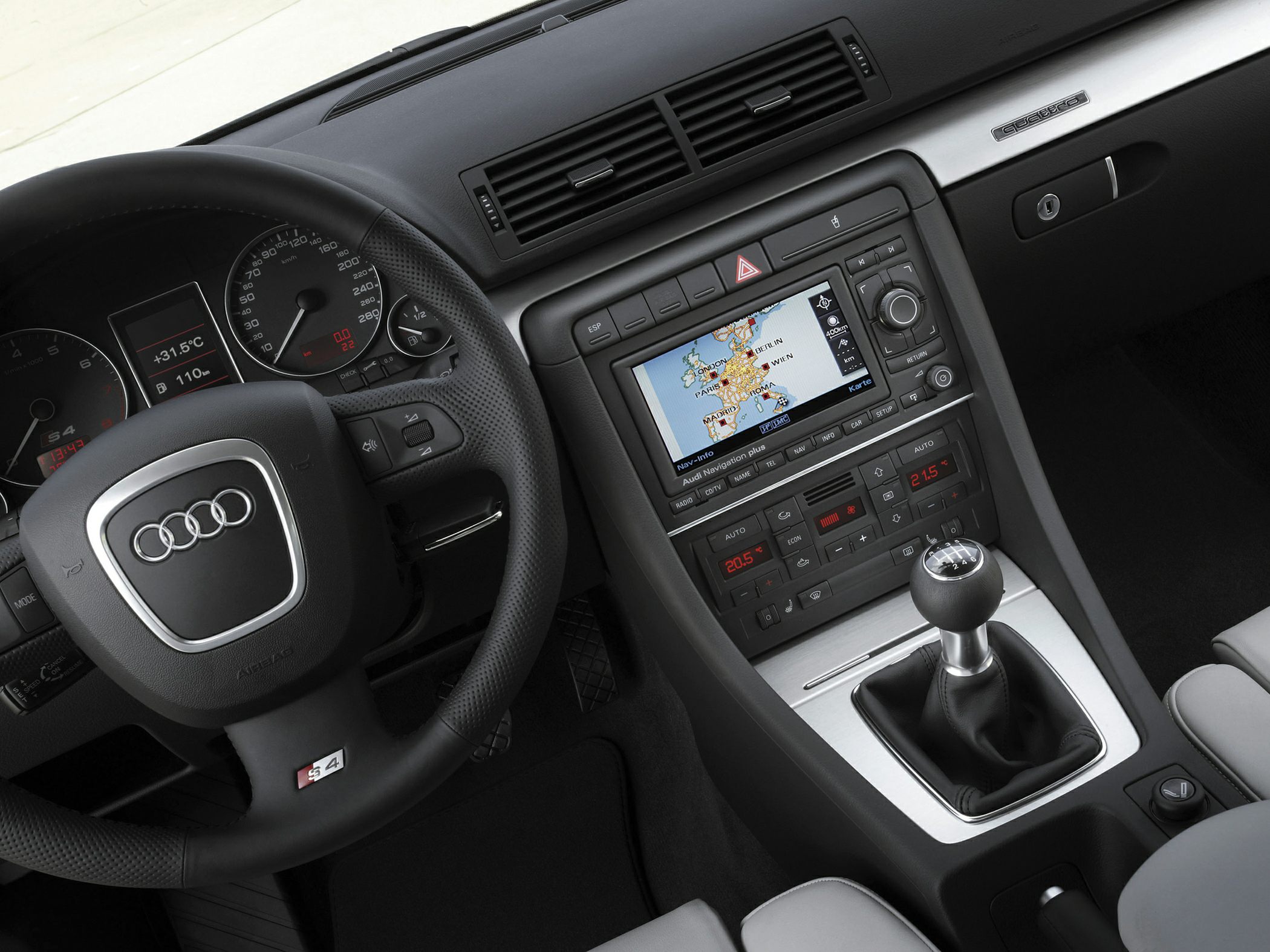 Dashboard with navigation screen and manual gear lever