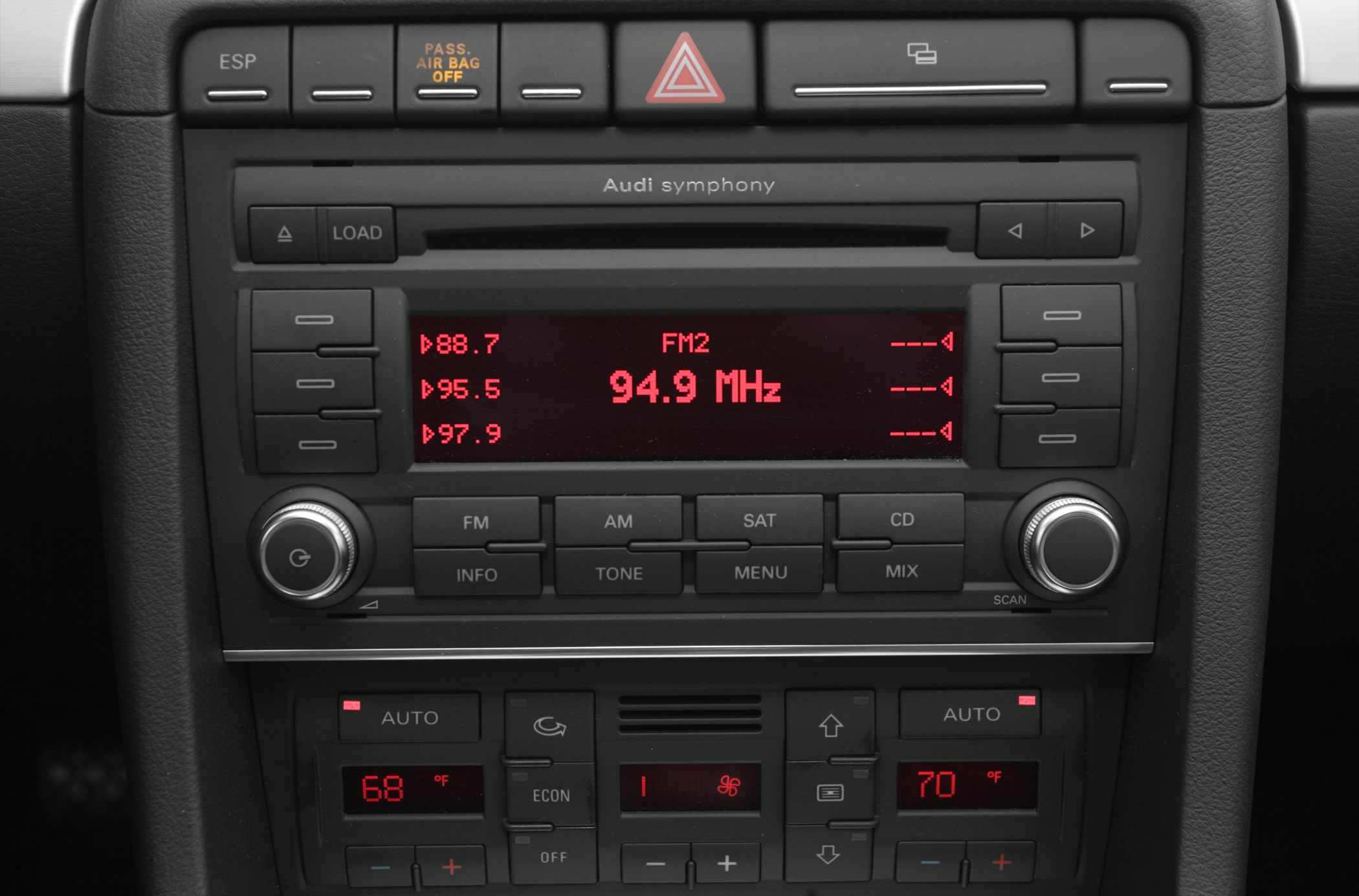 Audi car radio and dual-zone climate control with red LED display