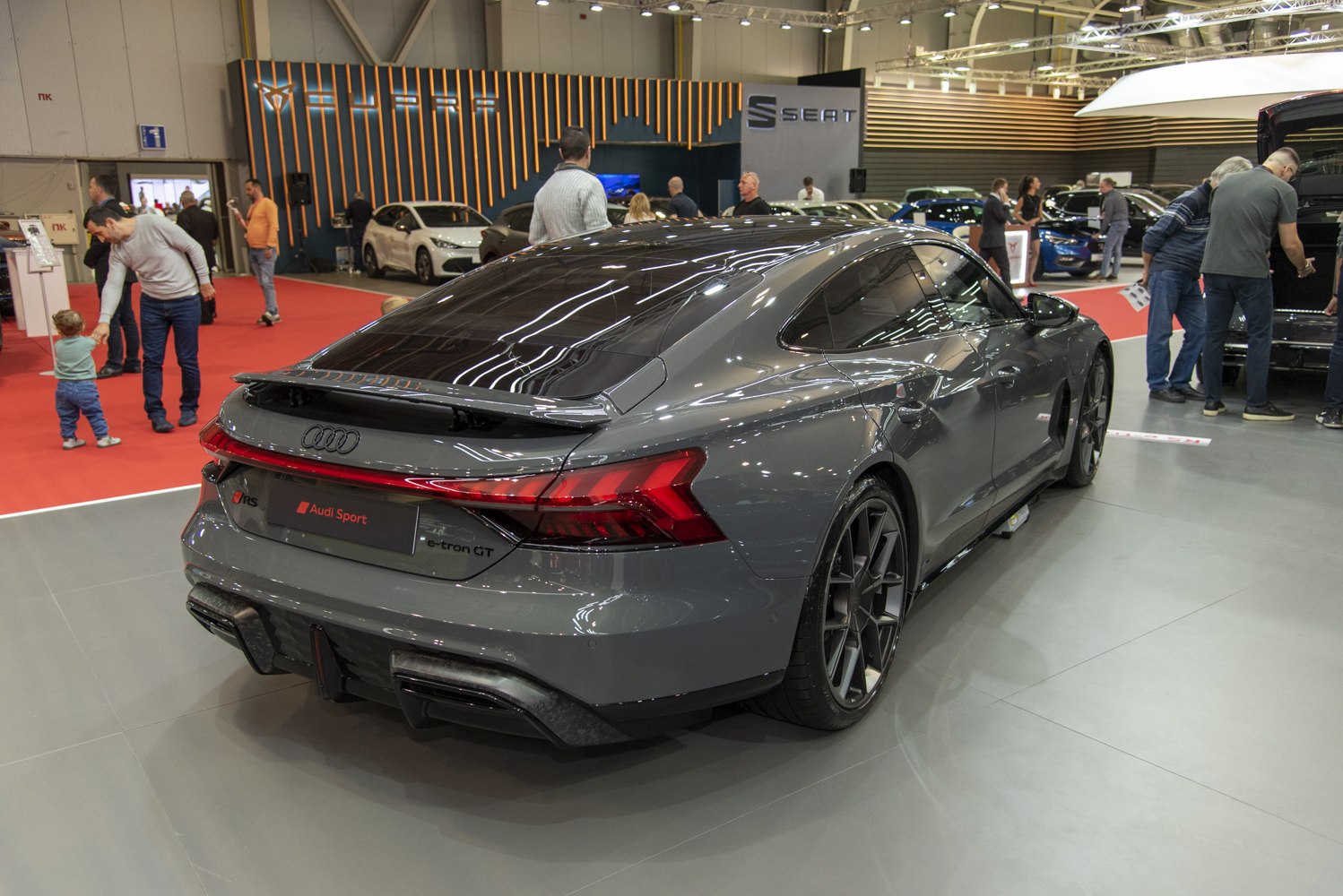 Rear view with LED taillights and sporty spoiler