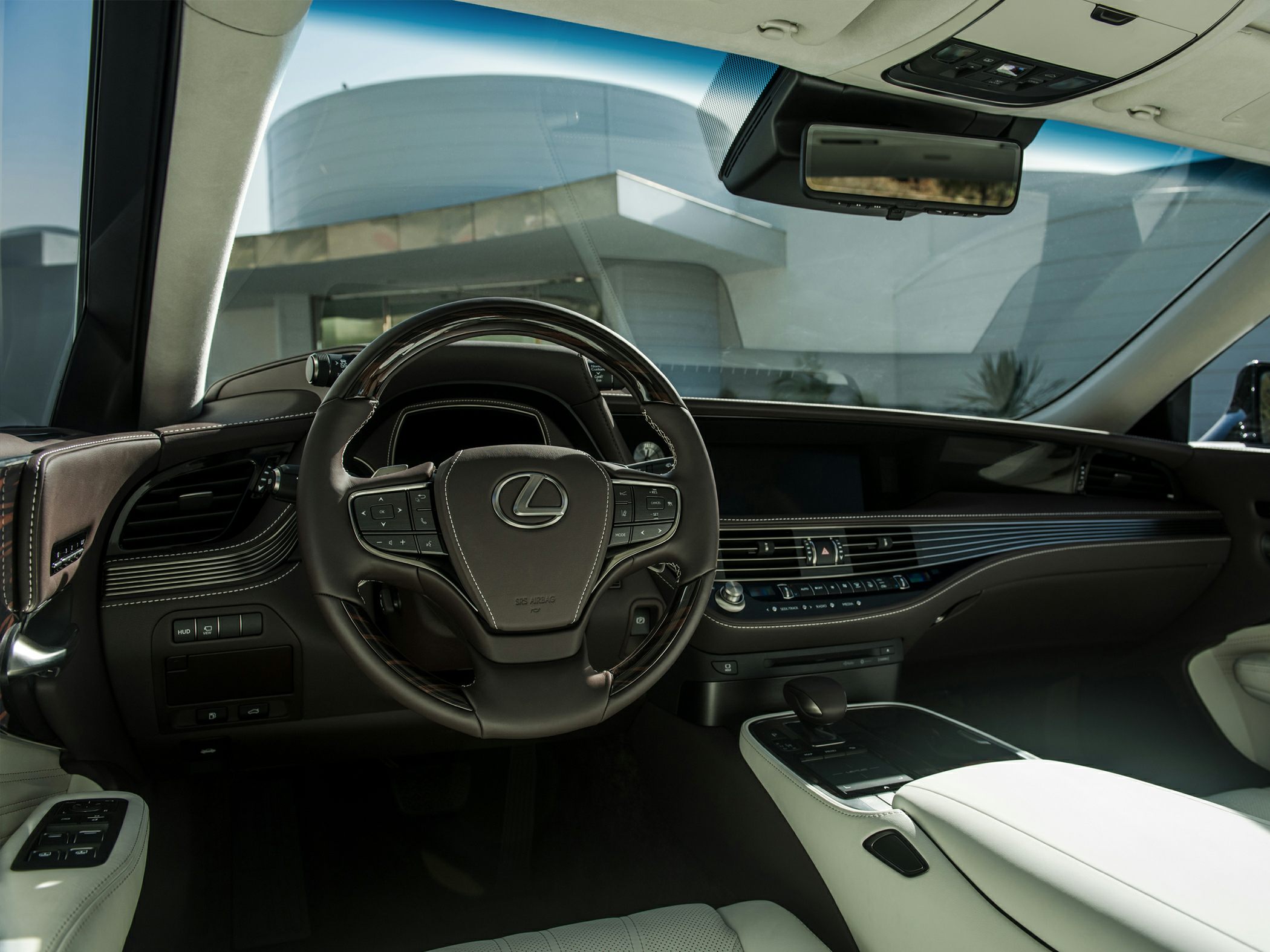 Luxury steering wheel and dashboard with integrated controls
