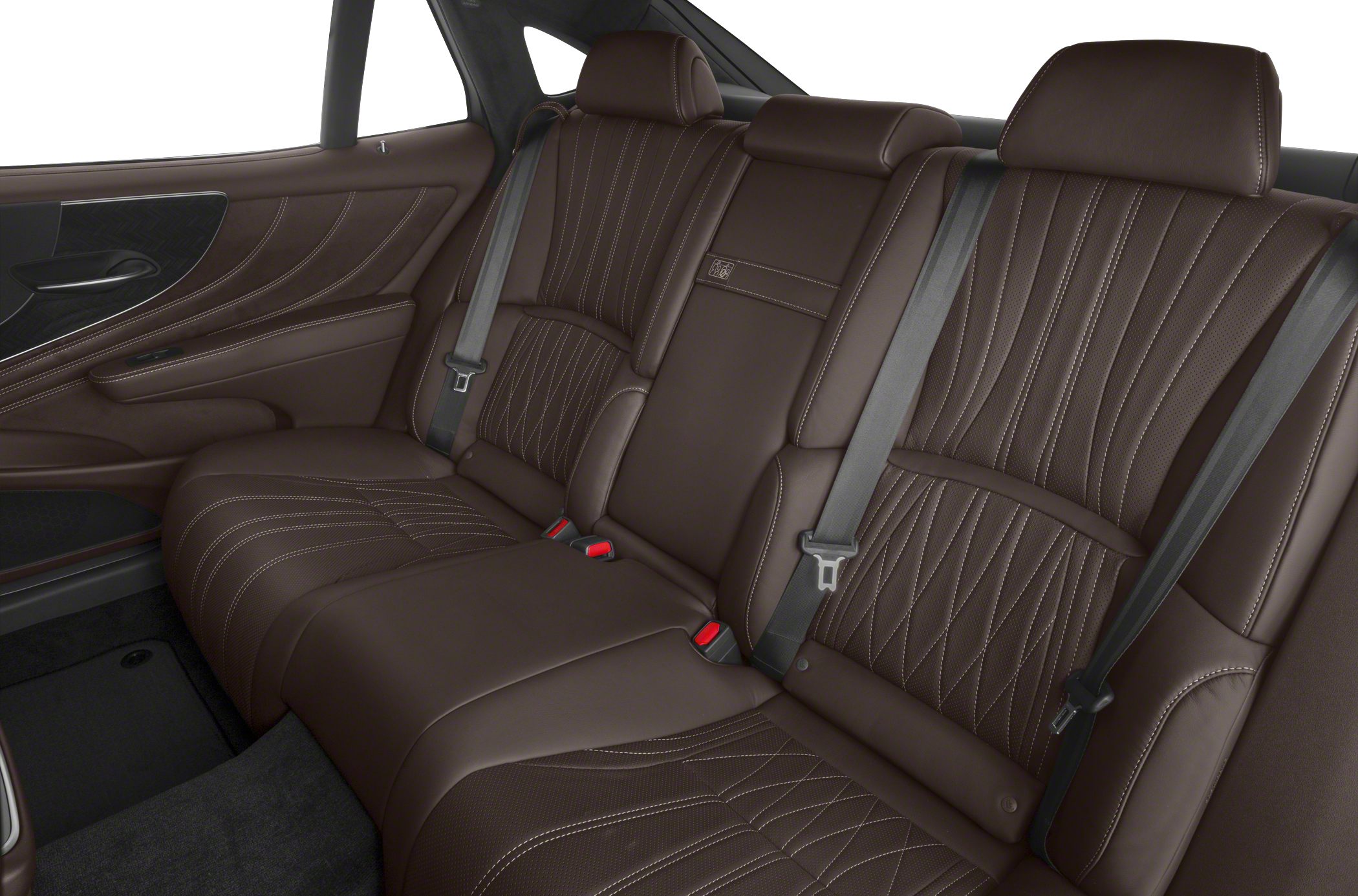 Luxury brown leather rear seats with intricate stitching and seatbelts