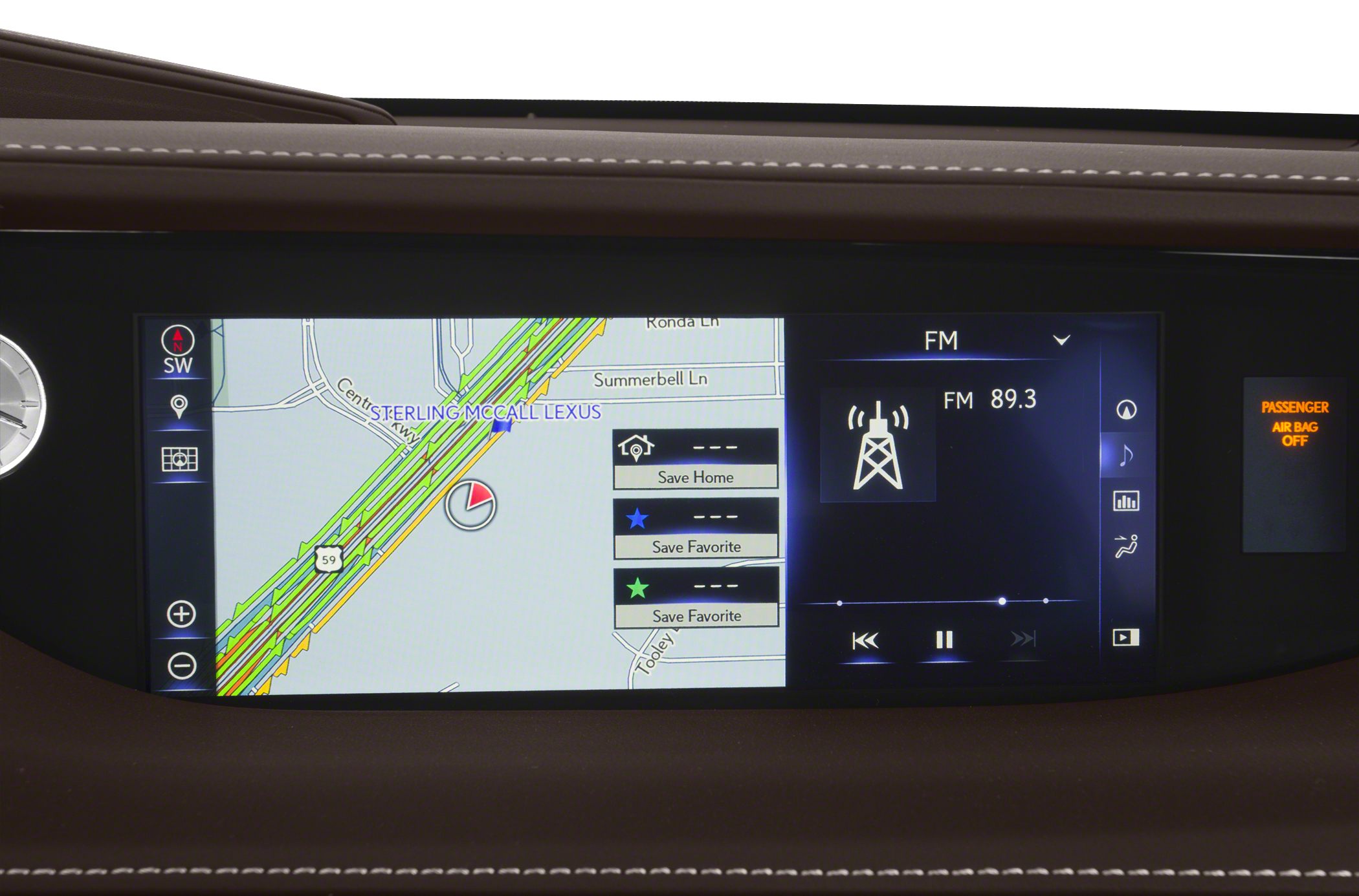 Infotainment screen displaying navigation map and FM radio controls